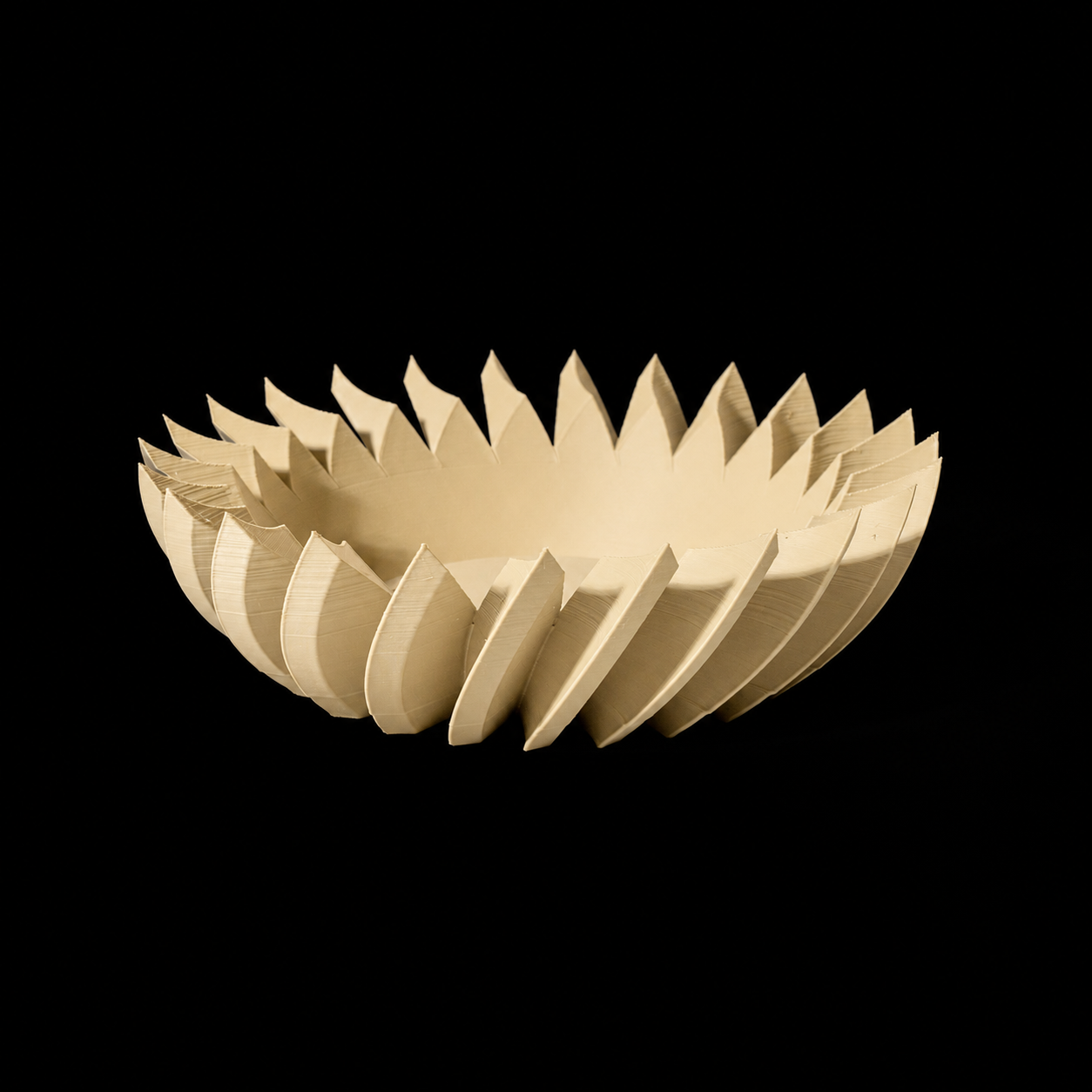 Modern Machine Vesper Bowl featuring a sleek, contemporary design with smooth curves and a glossy finish.