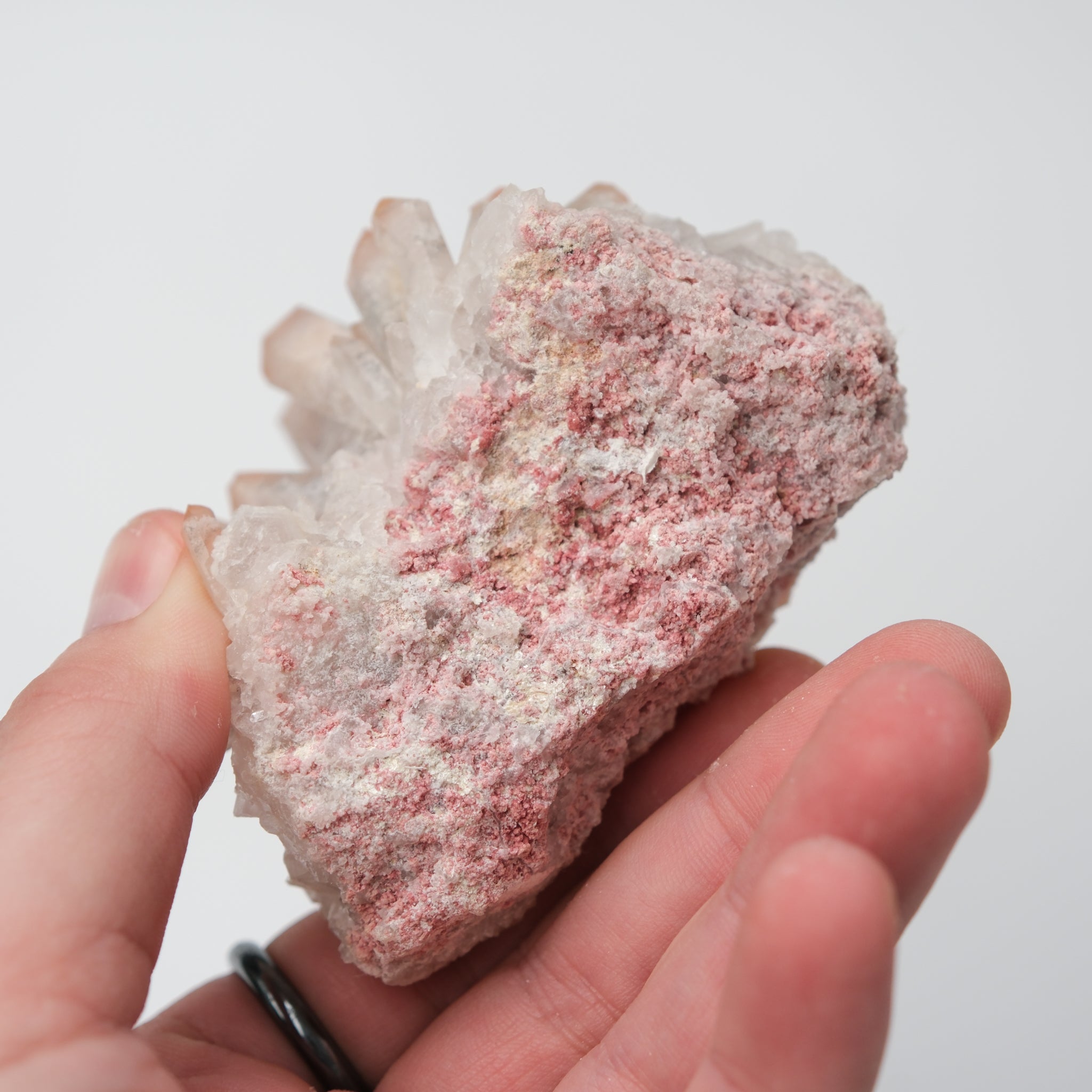 Orange River Quartz Cluster from Noctis Studio showcasing vibrant orange crystal formations on a natural mineral base.