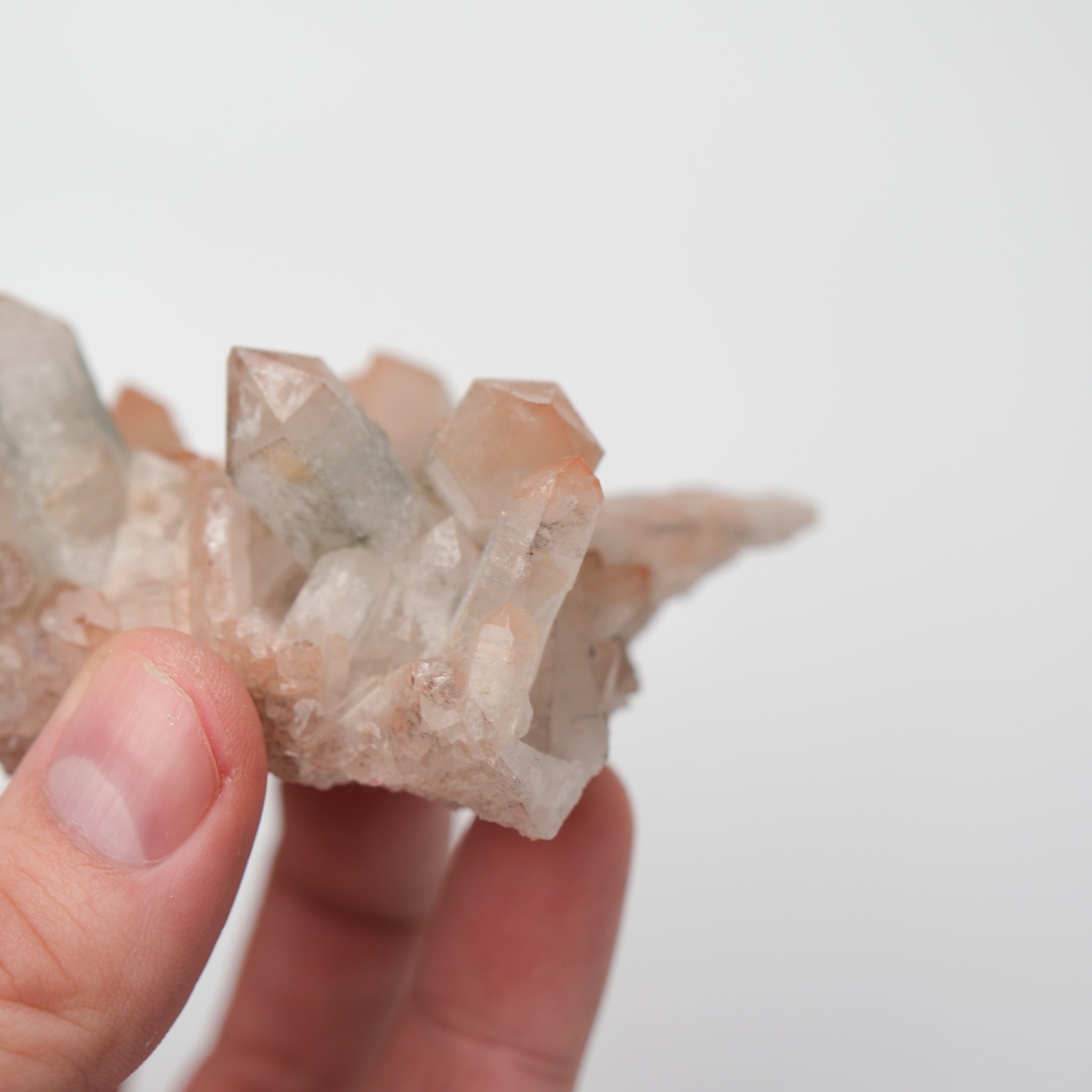 Orange River Quartz cluster from Noctis Studio, featuring vibrant orange crystals and natural mineral formations.