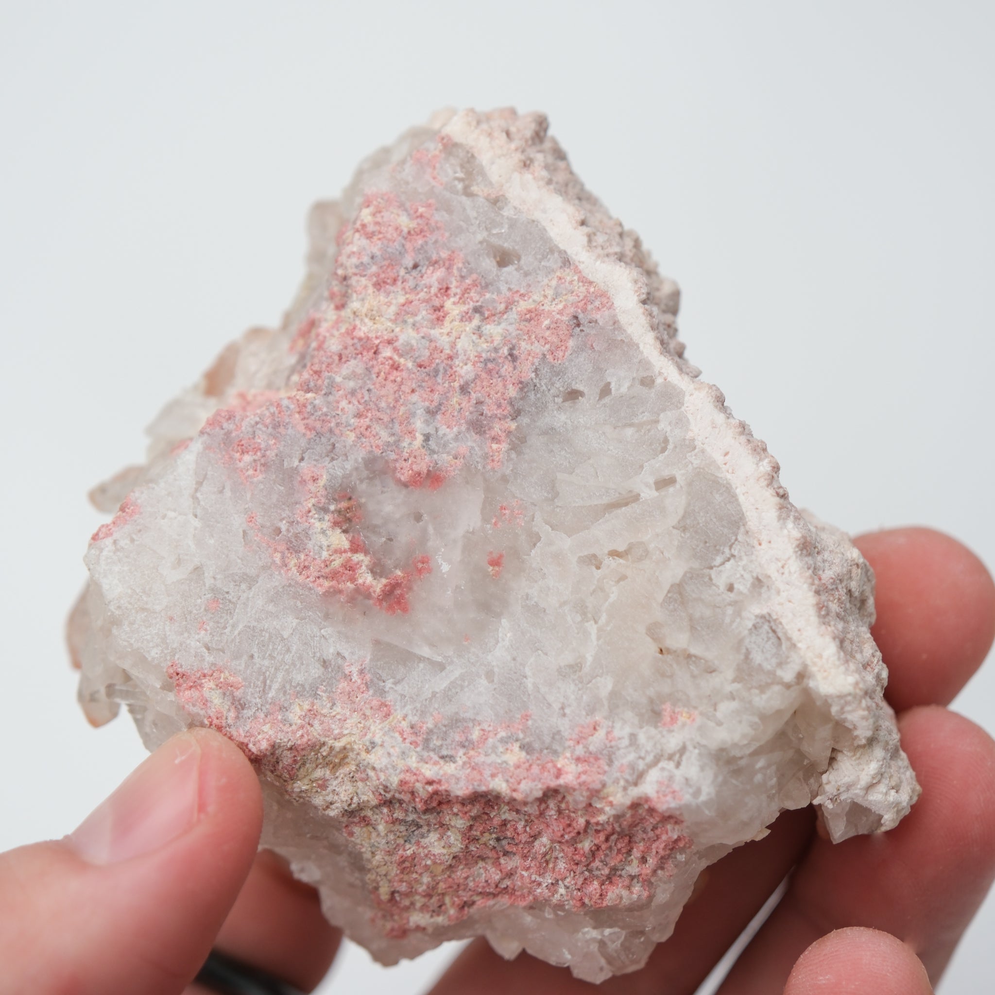 Orange River Quartz Cluster from Noctis Studio featuring vibrant orange quartz crystals arranged in a natural mineral formation.