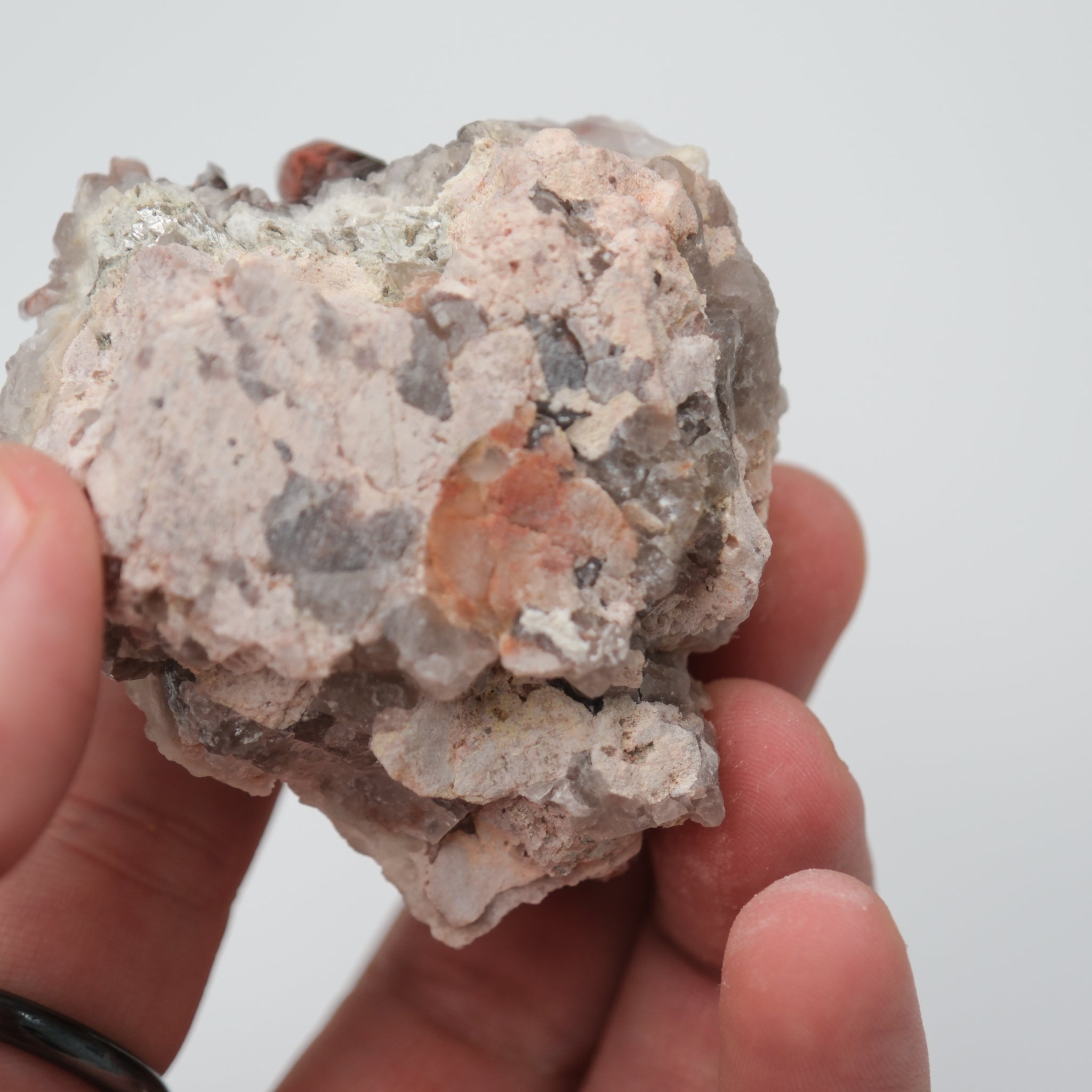 Orange River Quartz Cluster from Noctis Studio showing vibrant orange crystals and natural formation on a neutral background.