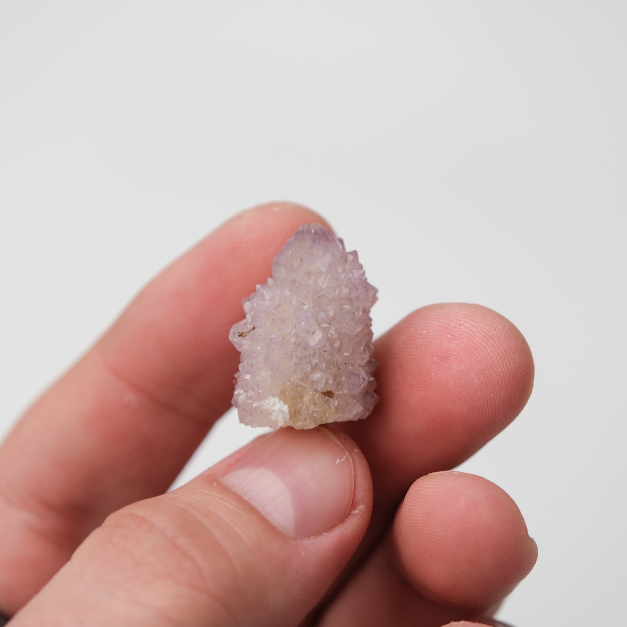 Natural Spirit Quartz cluster with clear, elongated crystals from Noctis Studio, showcasing its vibrant, sparkling mineral formation.