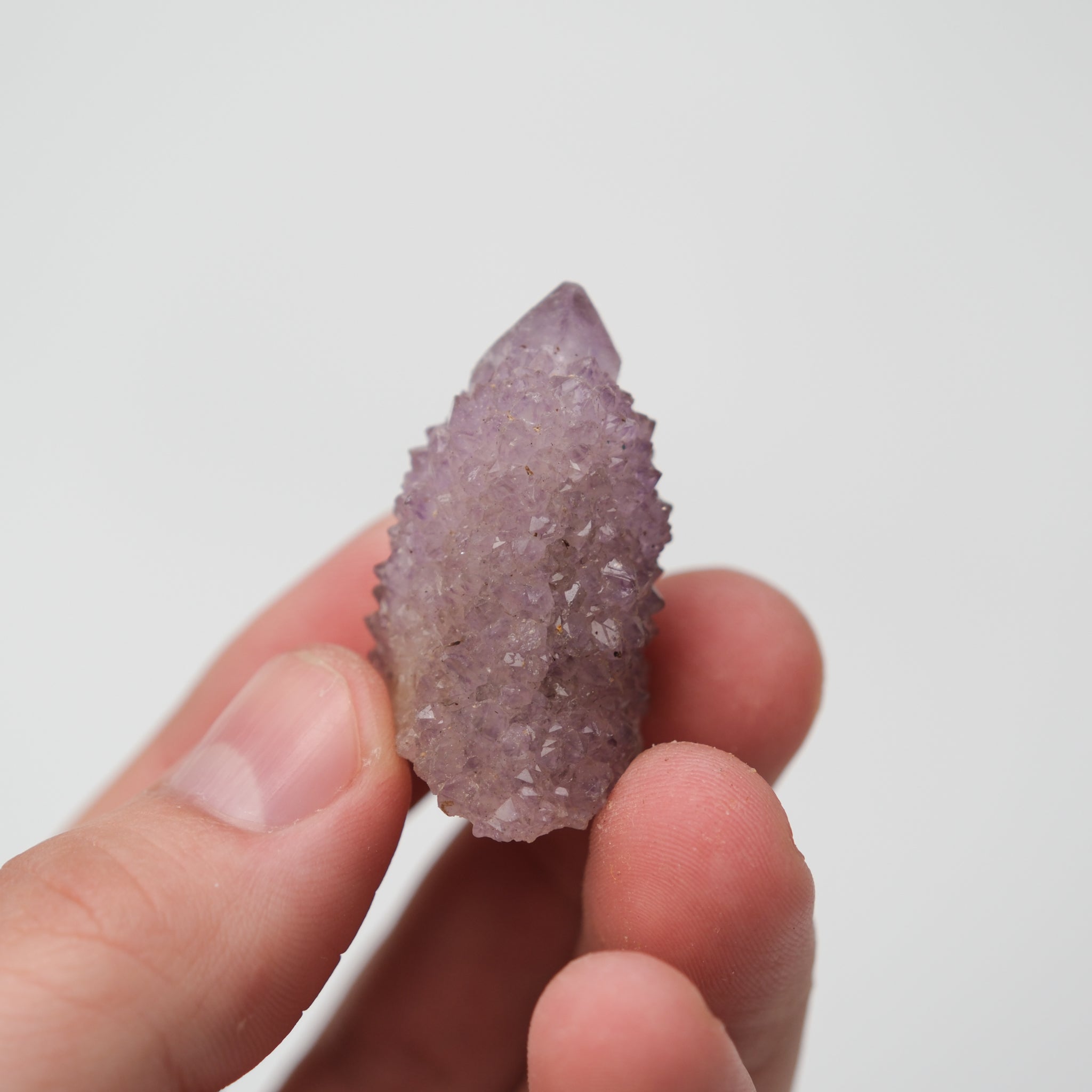Noctis Studio Spirit Quartz cluster with clear, elongated crystals arranged in a natural formation.