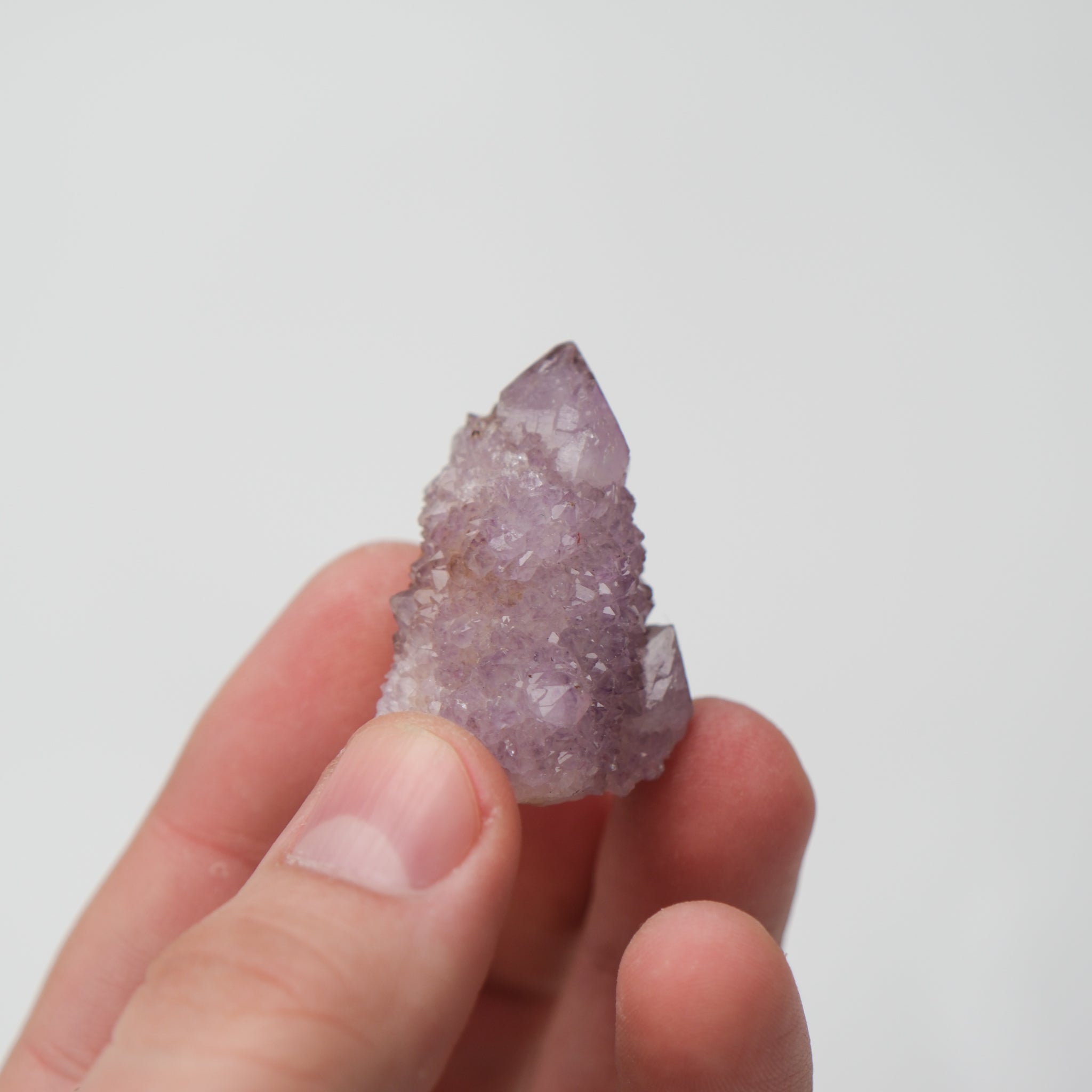 Noctis Studio Spirit Quartz cluster with clear, elongated crystal formations and vibrant natural mineral colors.