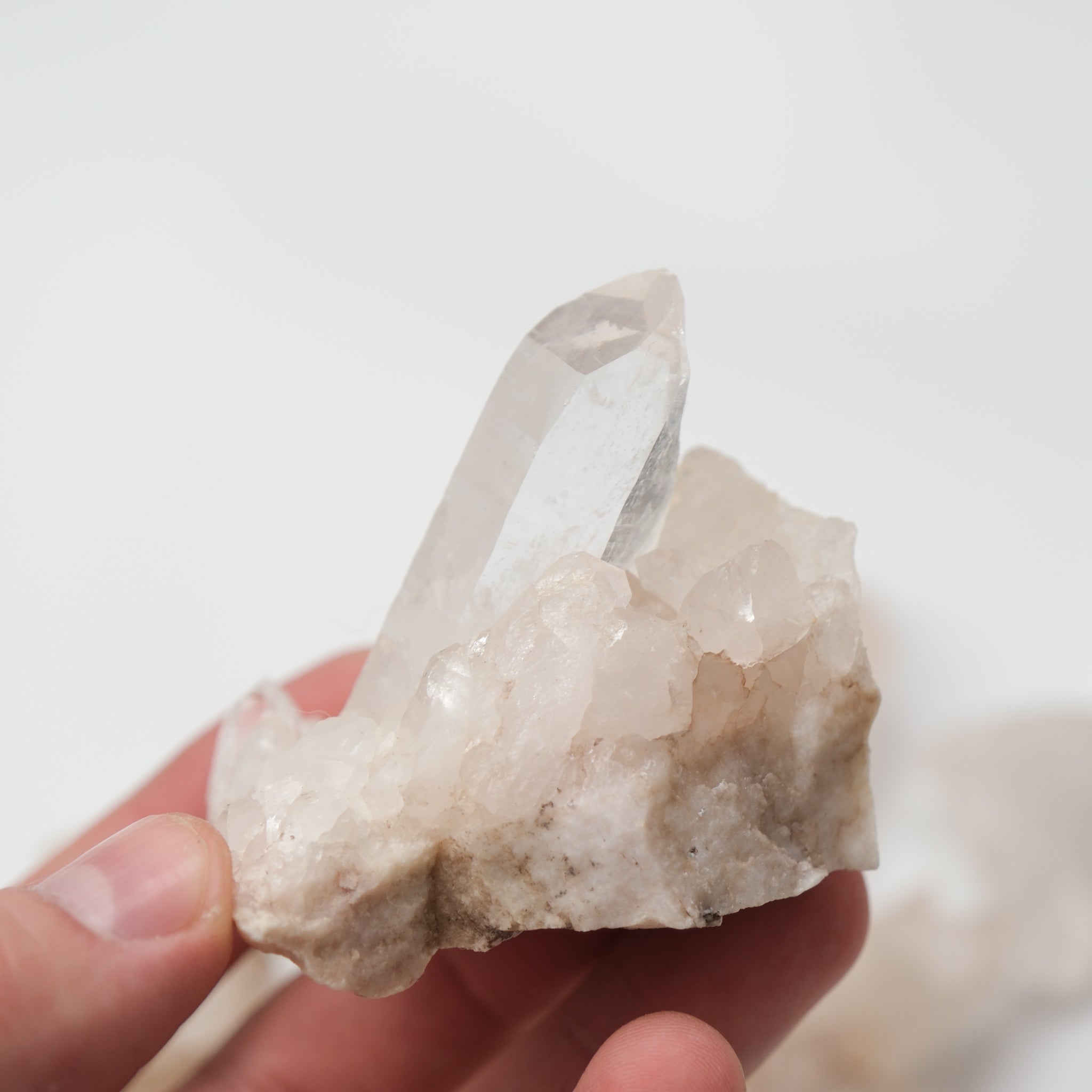 Himalayan Quartz Cluster from Noctis Studio, natural crystalline mineral formation with clear and smoky quartz points.