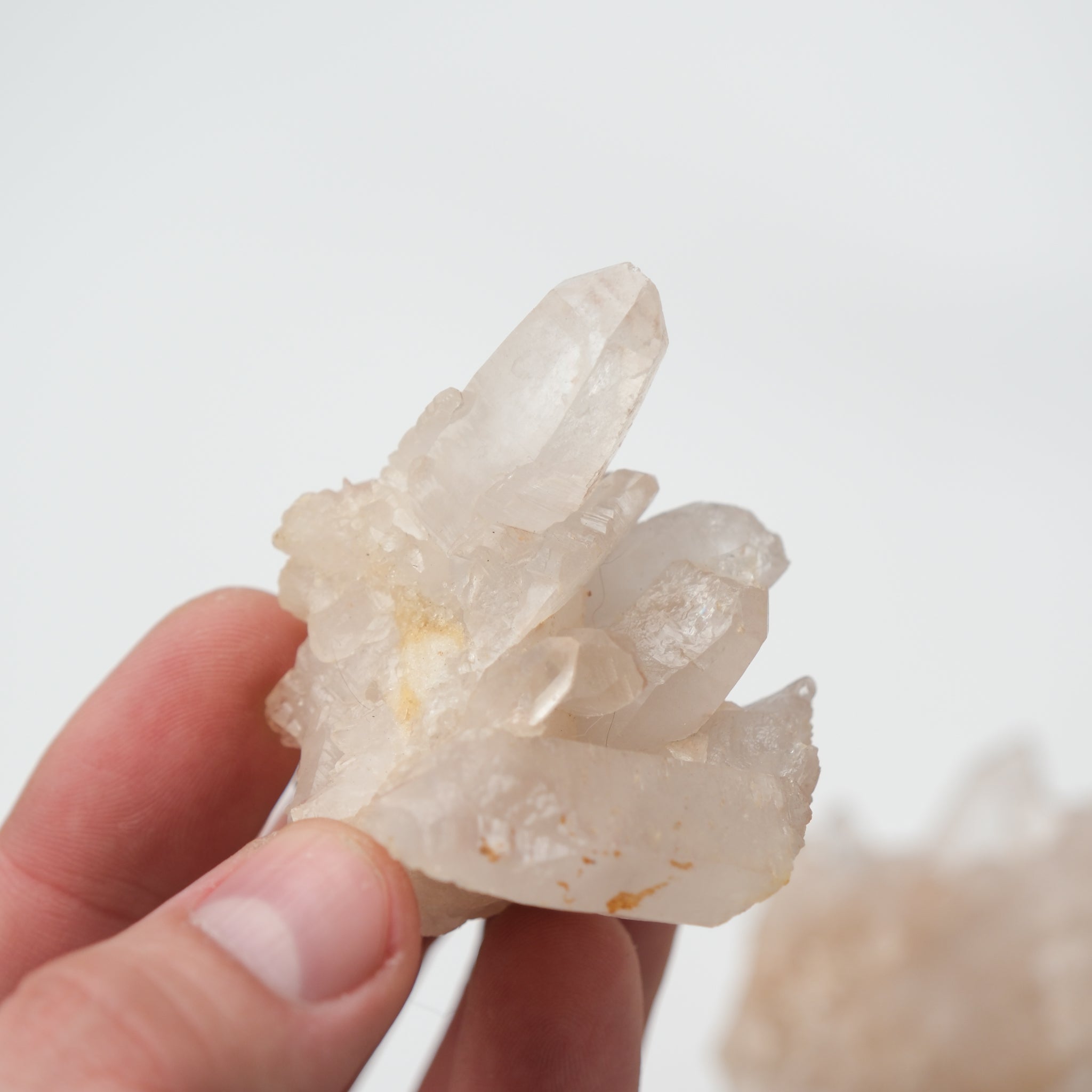 Himalayan Quartz Cluster from Noctis Studio showing clear, crystalline formations with a natural, rough mineral texture.