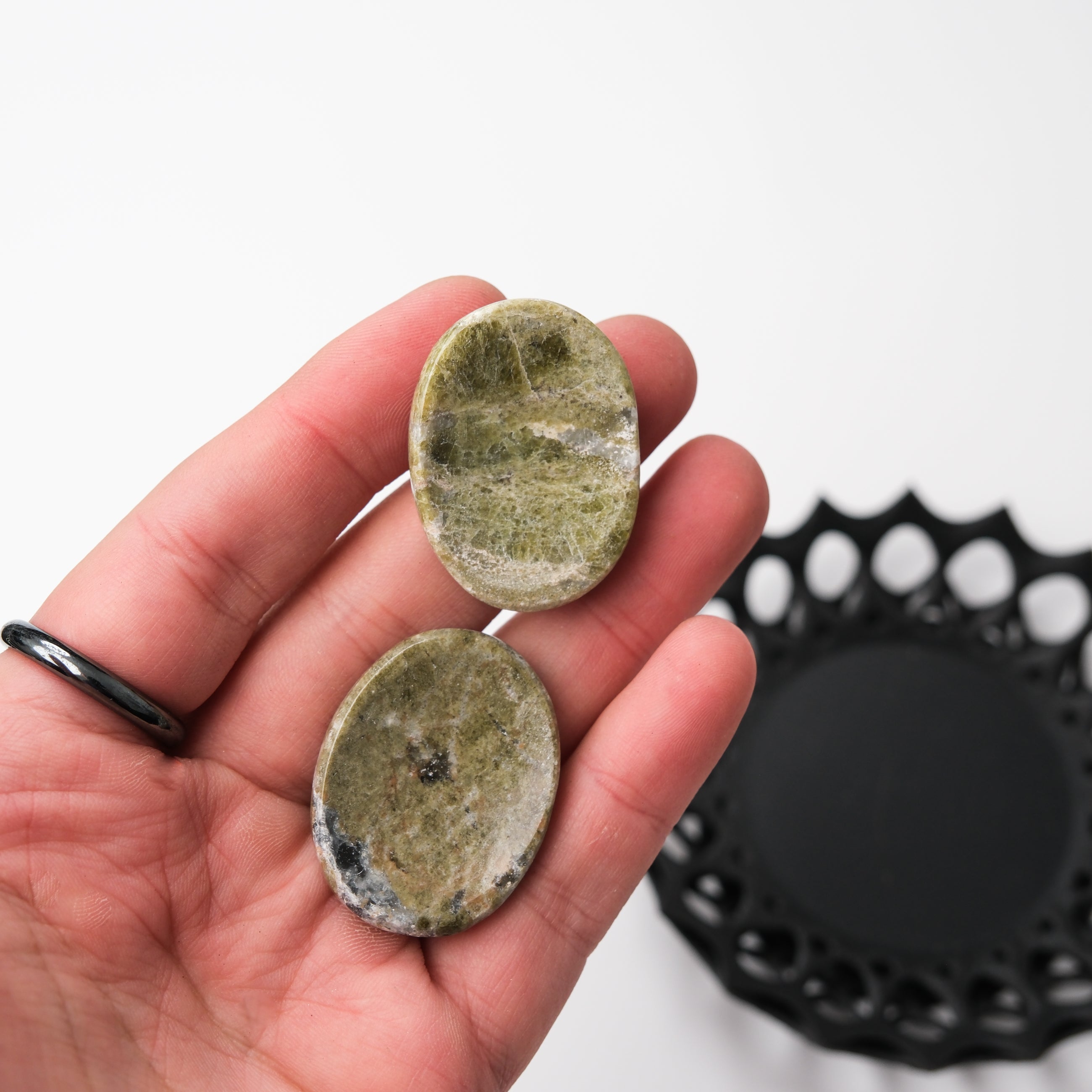 Vesonite worry stone from Noctis Studio featuring smooth, polished gray stone for stress relief and tactile comfort.