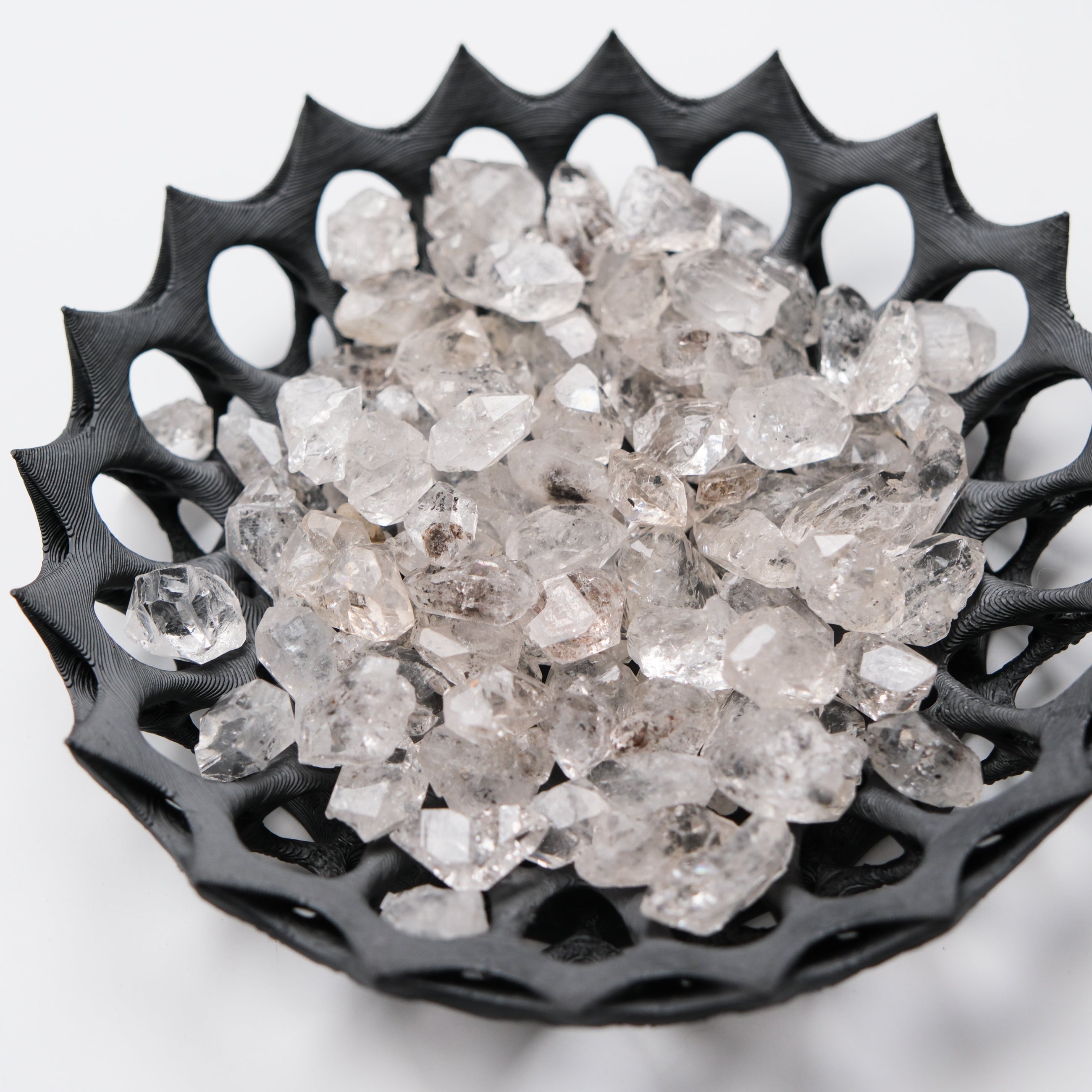 Diamond Quartz tumble stone from Noctis Studio, showcasing a polished, faceted quartz gemstone with sparkling clarity.