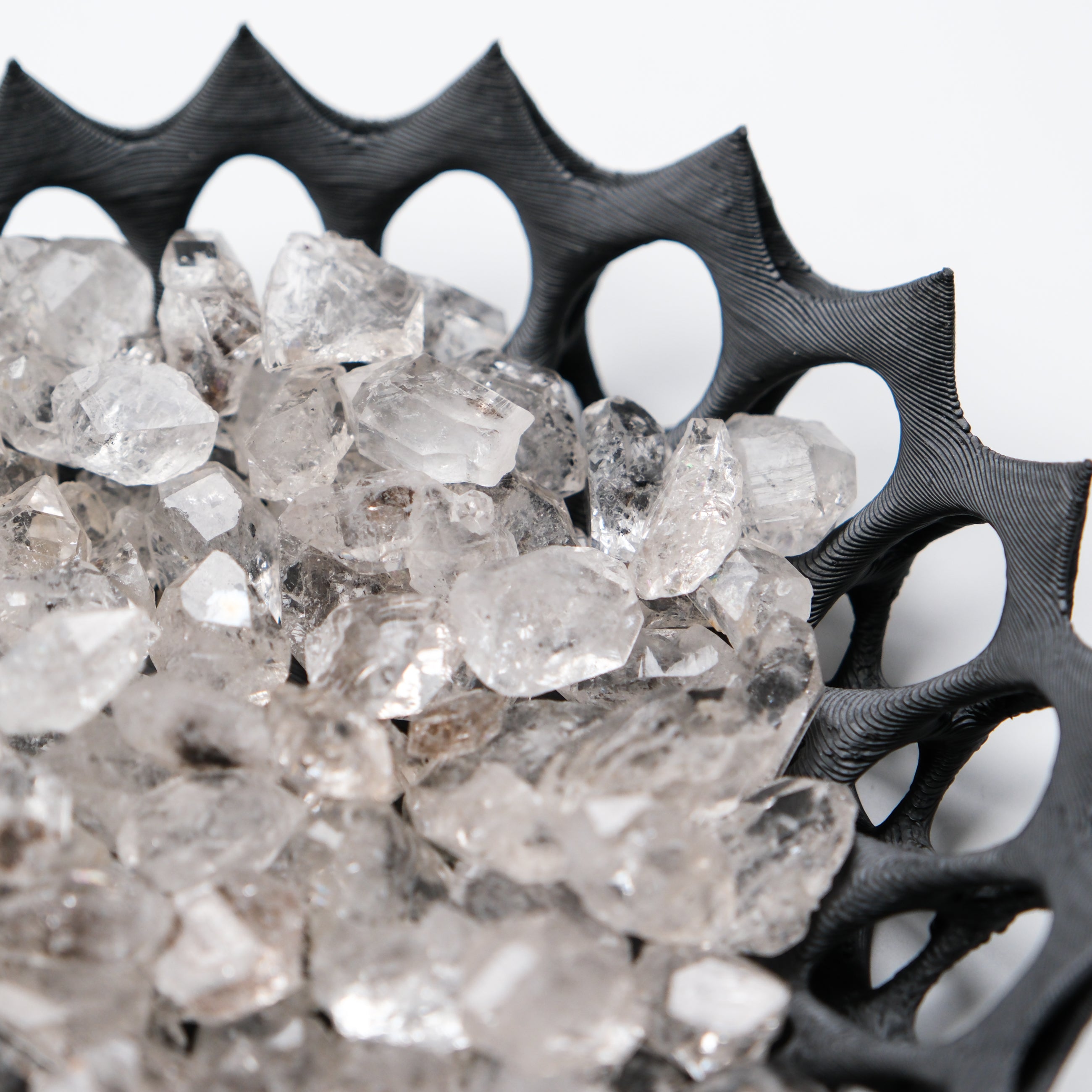 Noctis Studio Diamond Quartz Tumble Stone showing a polished, translucent gemstone with sparkling facets on a white background.