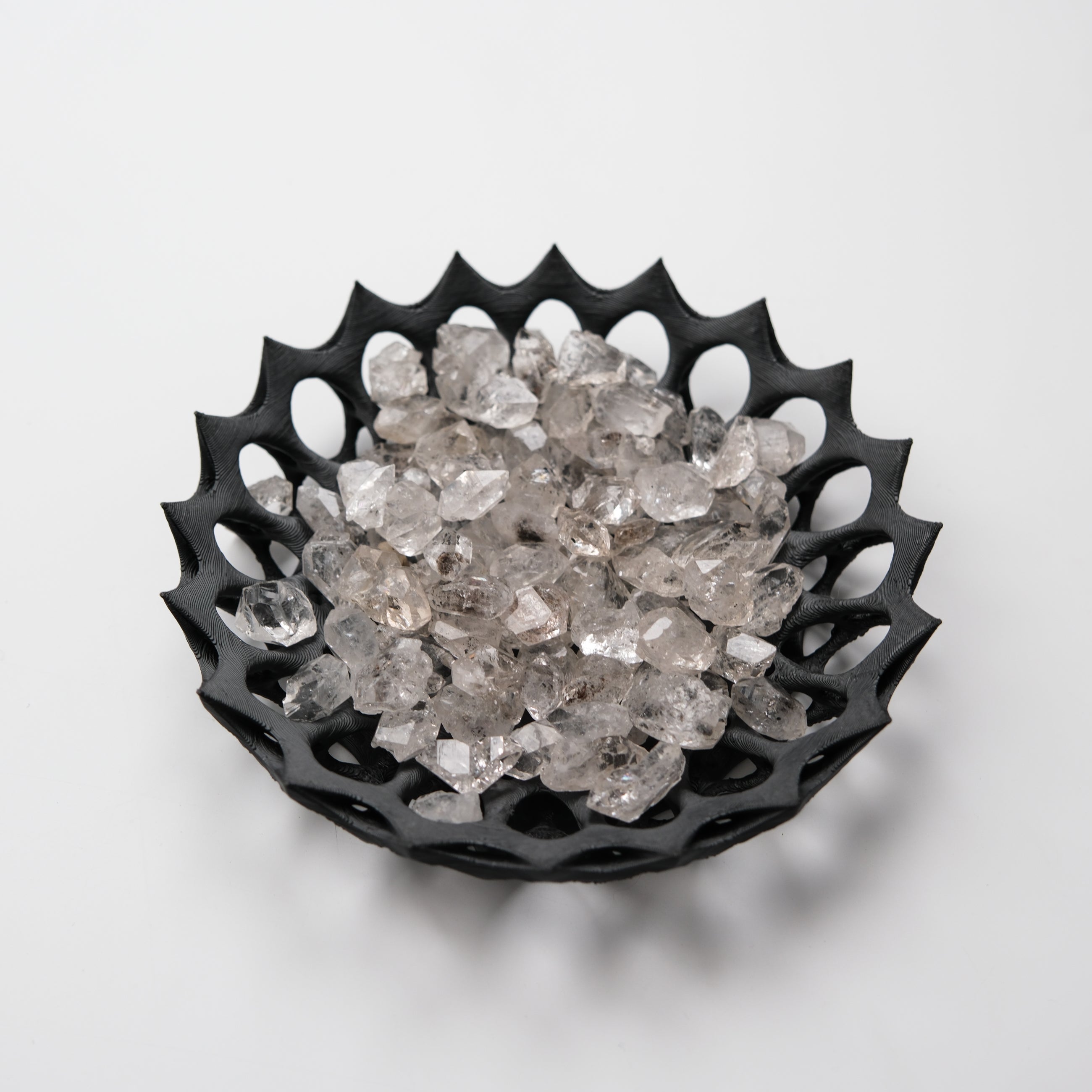 Diamond Quartz tumble stone from Noctis Studio showcasing a polished, clear quartz crystal with diamond-like facets.