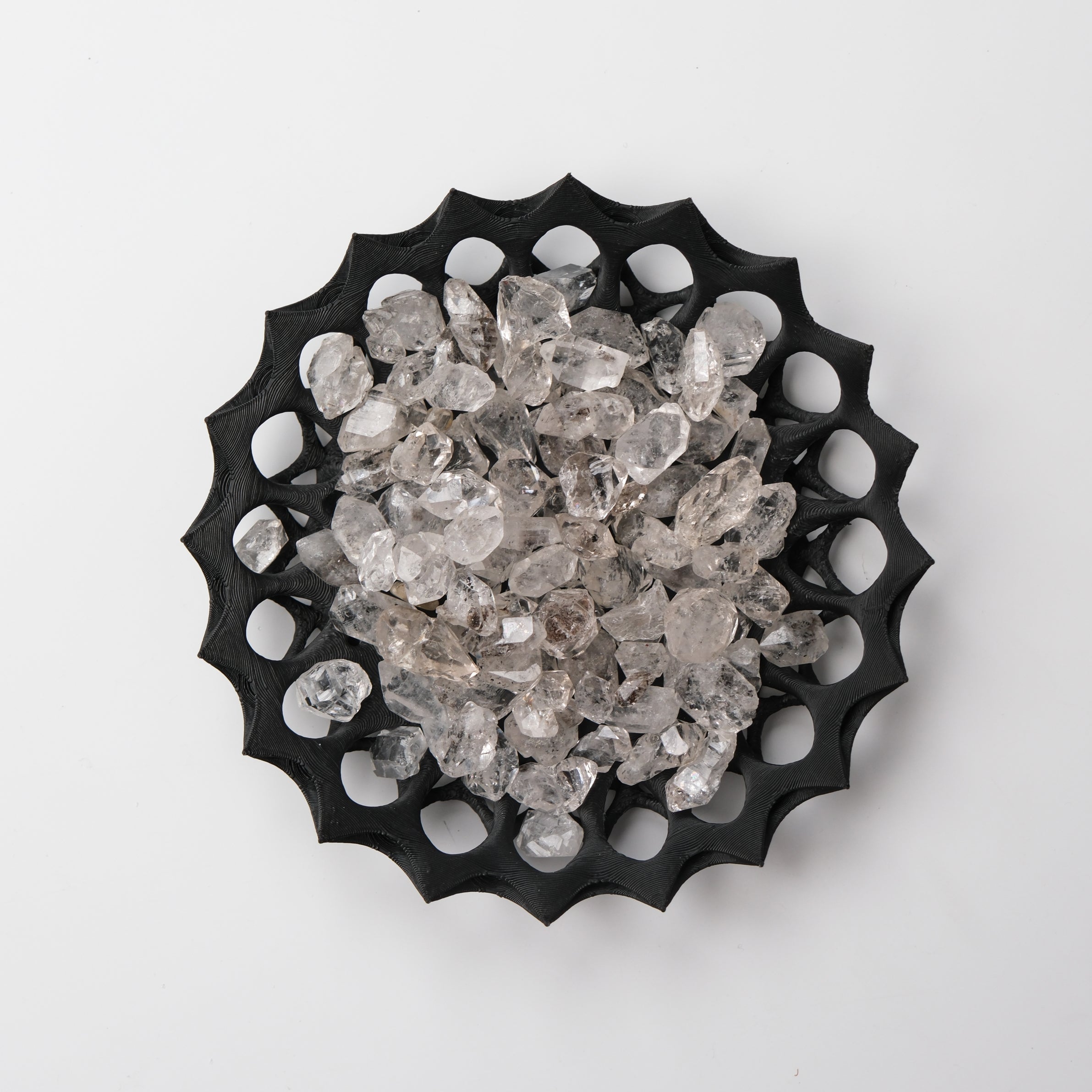 Noctis Studio Diamond Quartz Tumble Stone showing a smooth, polished crystal with sparkling facets and a translucent appearance.