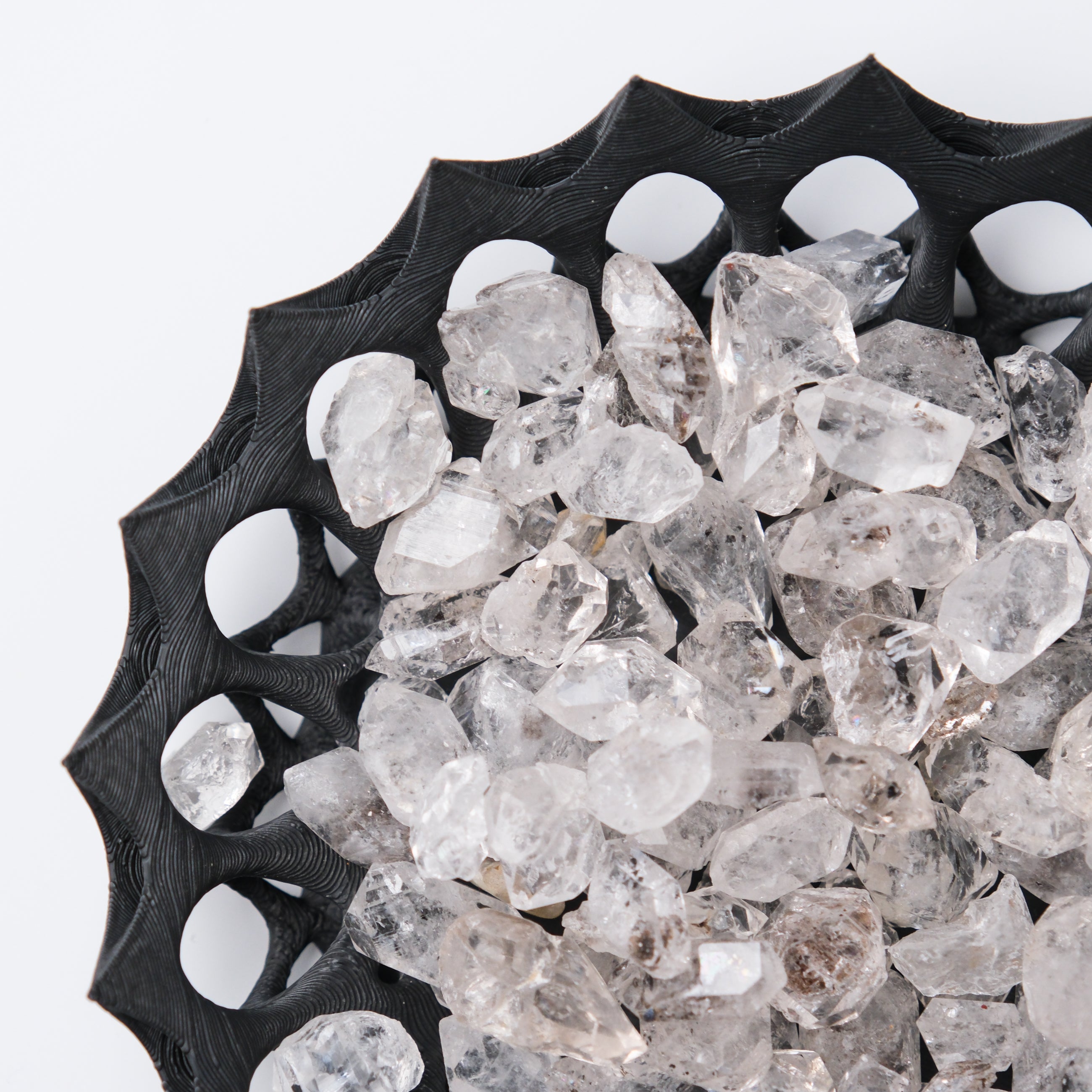 Diamond Quartz tumble stone from Noctis Studio, showcasing a polished, natural quartz crystal with diamond-like clarity and facets.
