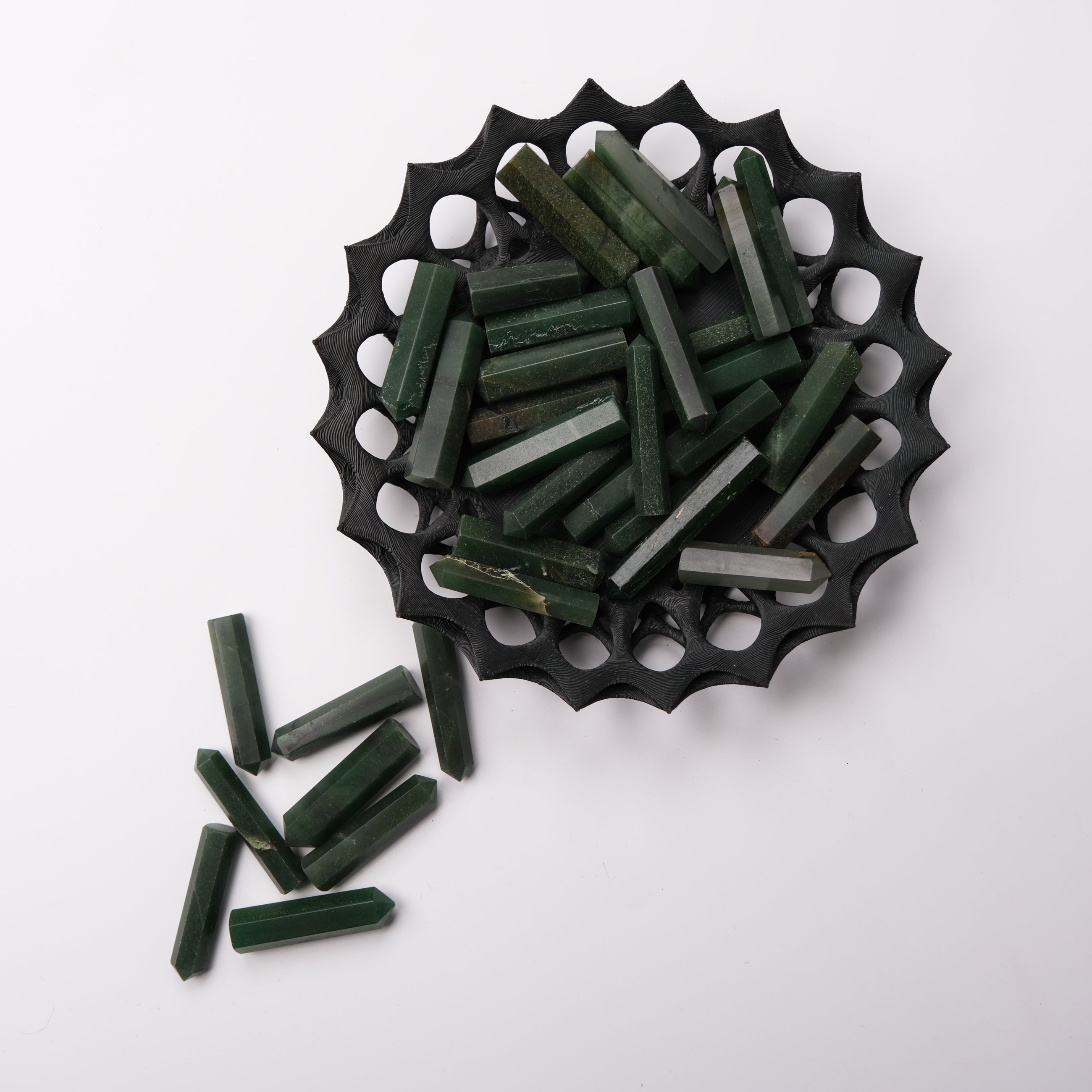 Dark green aventurine single gridding point from Noctis Studio, polished gemstone for crystal grid setups.