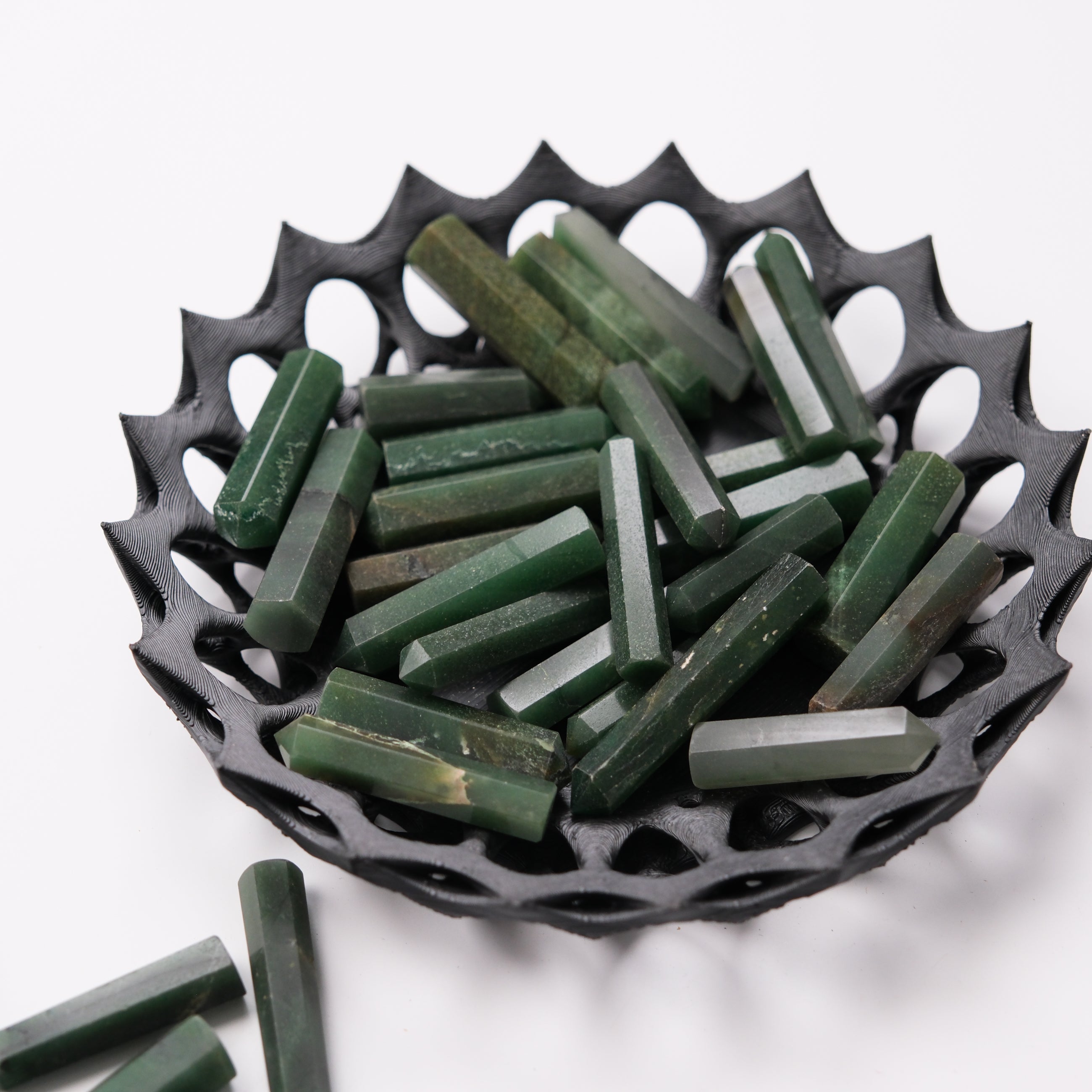 Dark green aventurine single gridding point by Noctis Studio, polished gemstone with pointed tip for crystal healing and energy work.