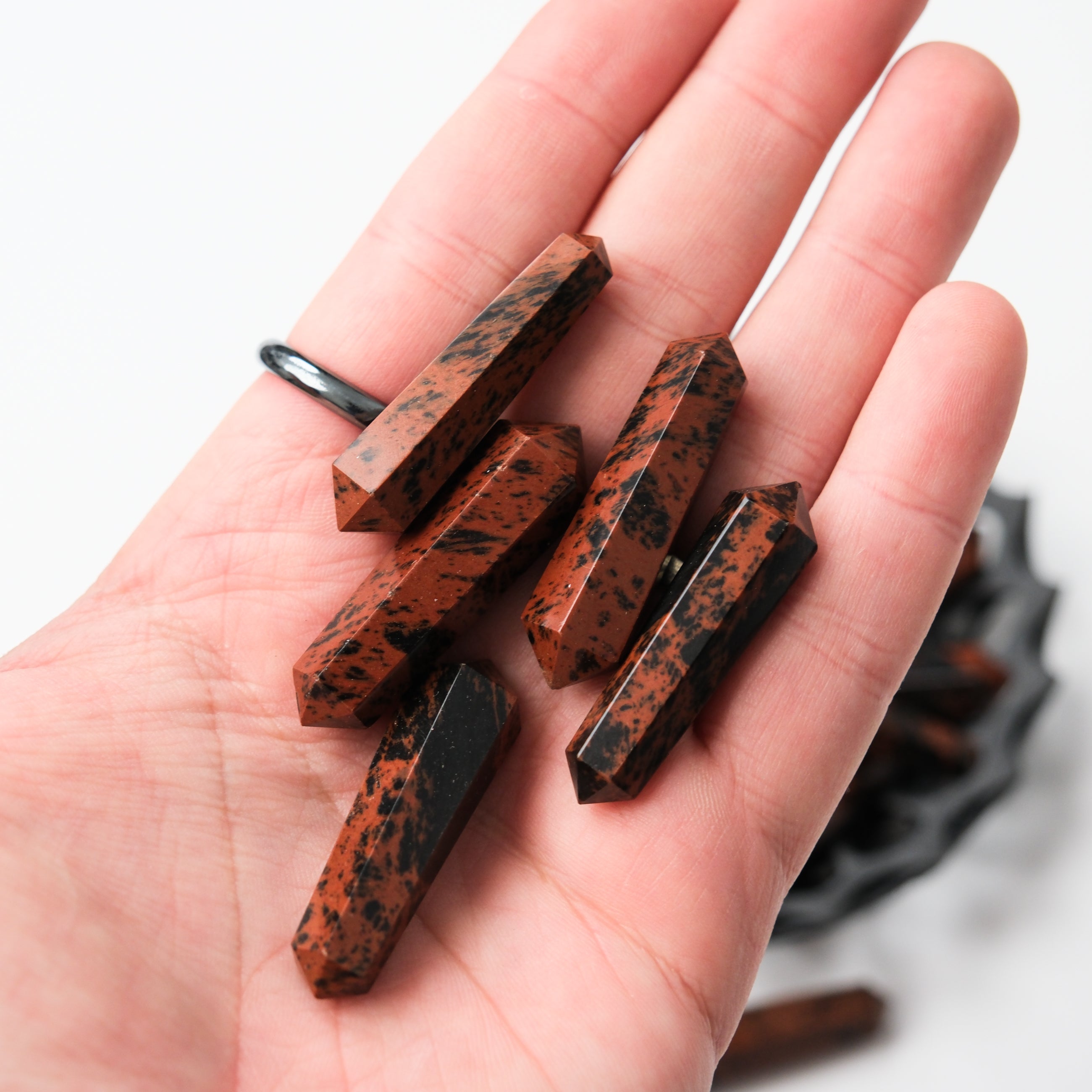 Noctis Studio mahogany obsidian double gridding point with sharp tip and polished finish for crystal healing and energy work.
