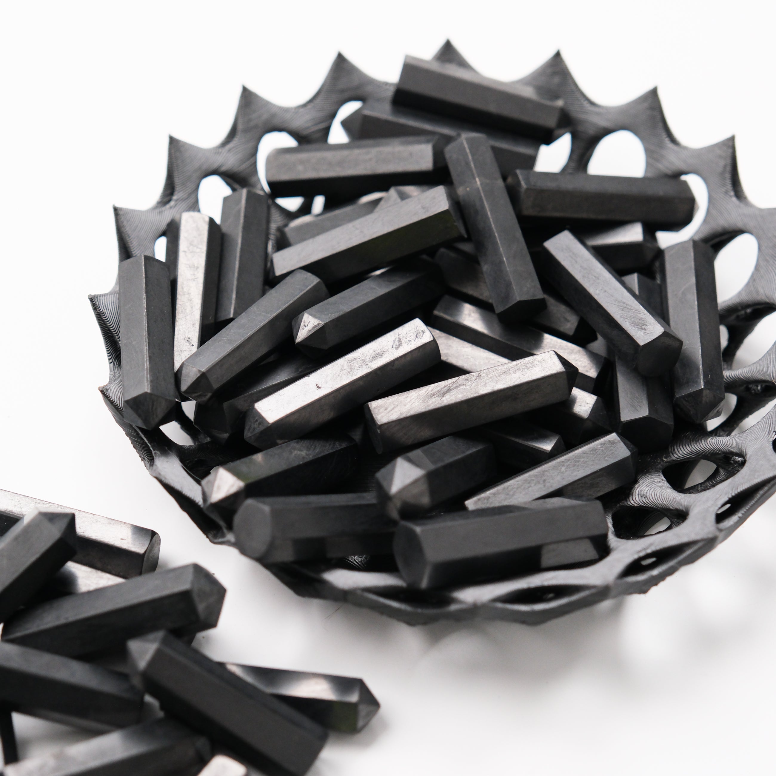 Shungite single gridding point from Noctis Studio, showcasing a polished black crystal used for energy healing and spiritual practices.