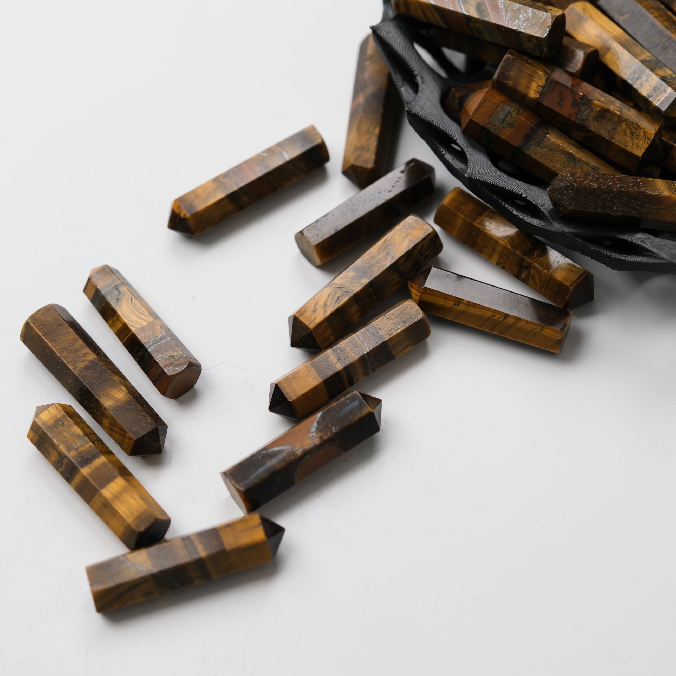 Tigers Eye single gridding point by Noctis Studio, a jewelry-making tool with a polished tiger's eye stone tip for precise work.