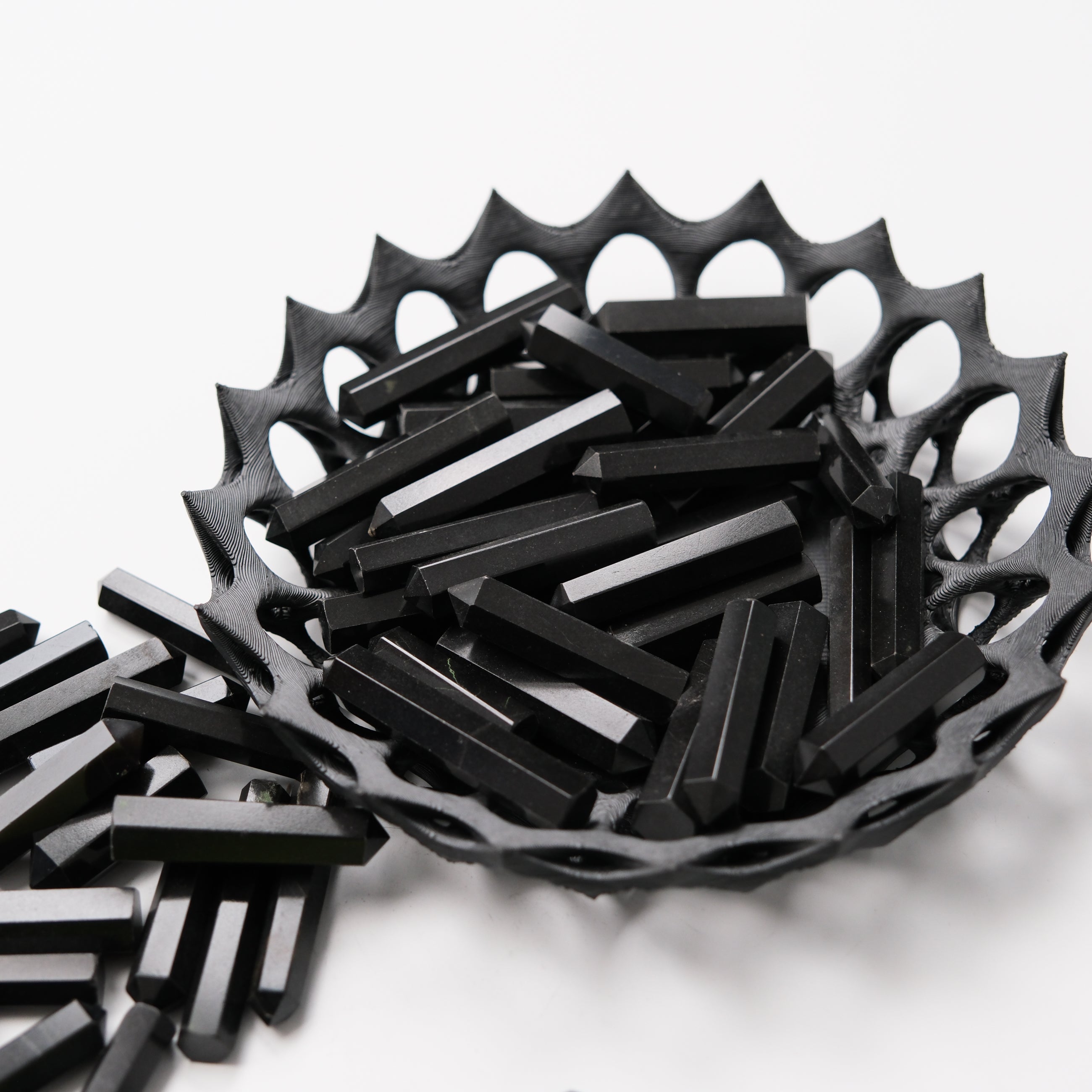 Black Jasper Single Gridding Point by Noctis Studio, a detailed gemstone tool for artistic or crafting use.