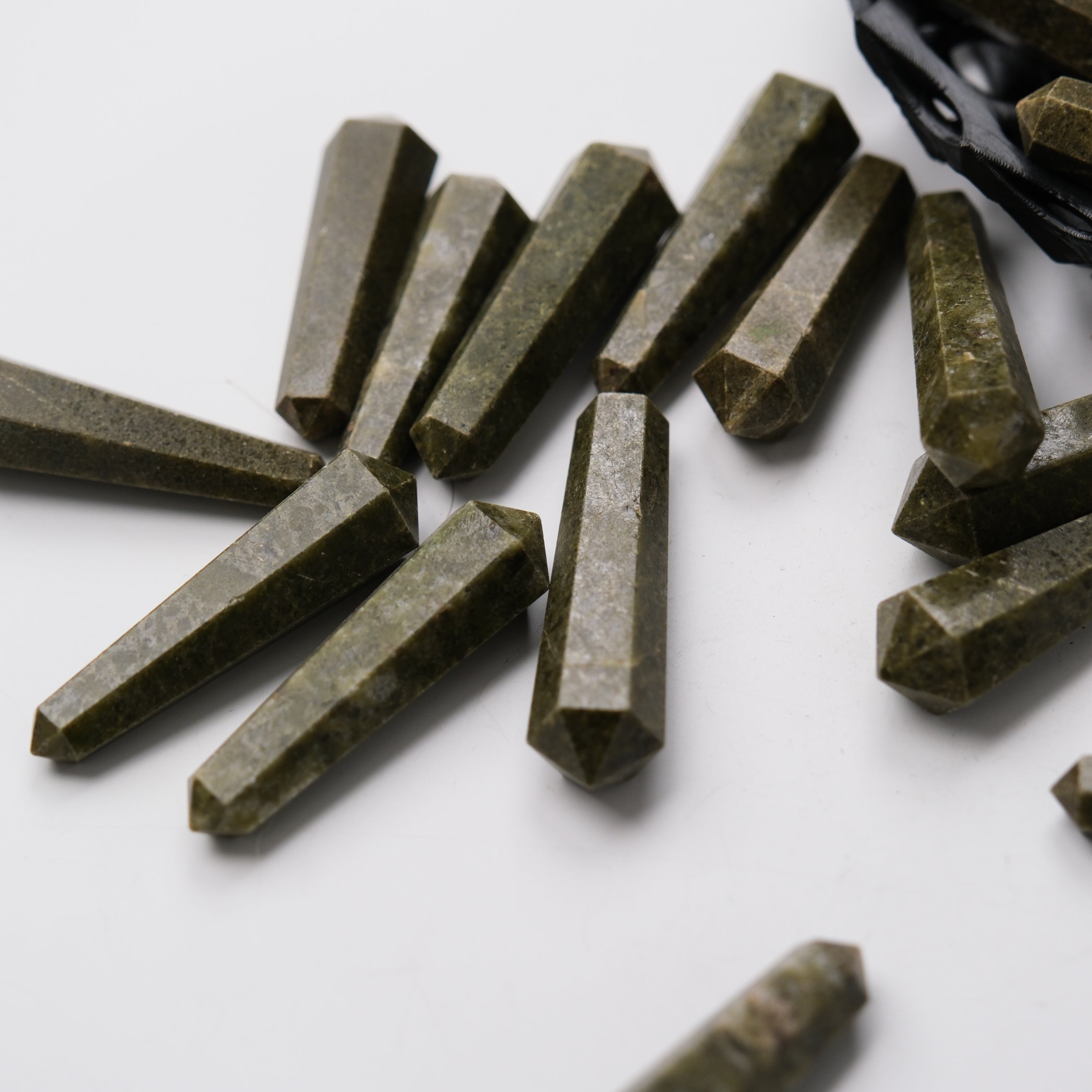 Noctis Studio green jasper double gridding point with intricate details, used for clay or sculpture work.