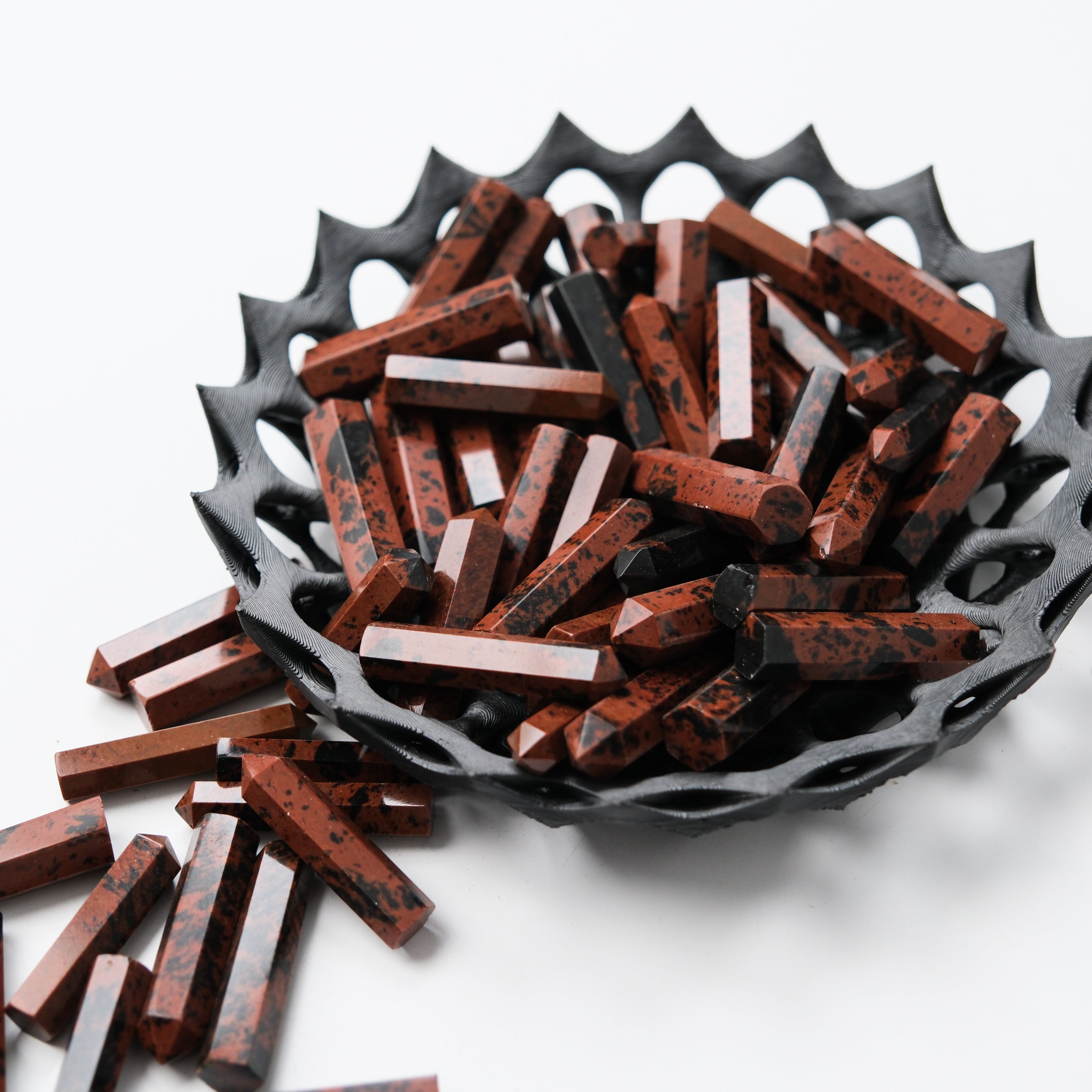 Mahogany Obsidian single gridding point by Noctis Studio, featuring a polished, pointed gemstone for crystal grid creation.