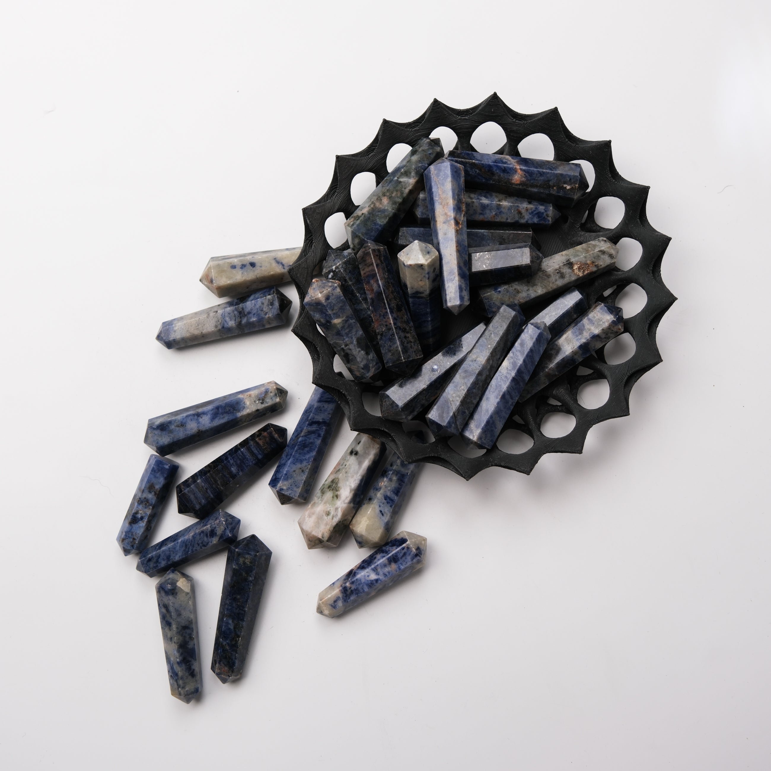 Noctis Studio sodalite double gridding point with deep blue and white mineral patterns, used for crystal healing and energy work.