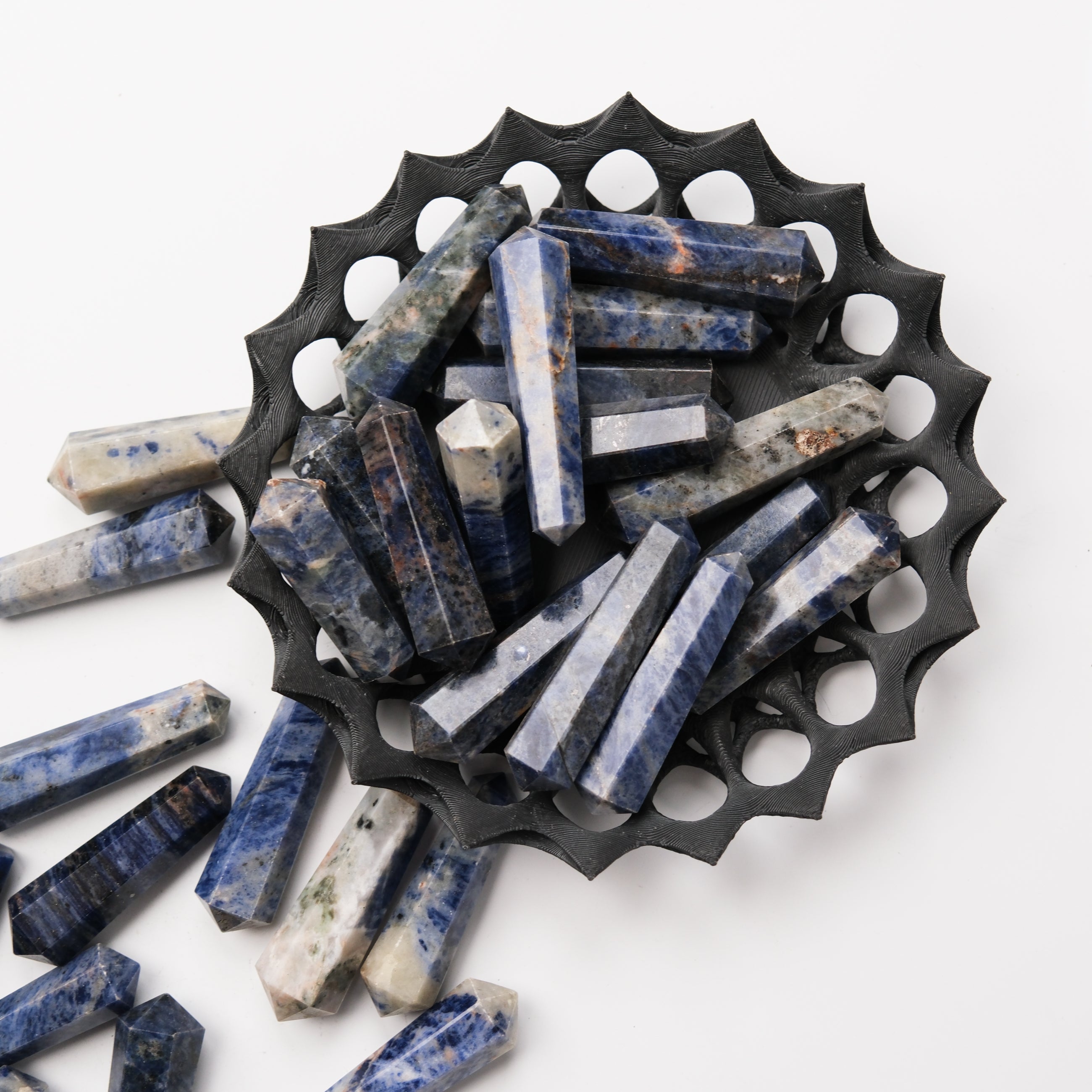 Noctis Studio Sodalite Double Gridding Point gemstone for crystal healing and energy work, featuring rich blue and white veining.