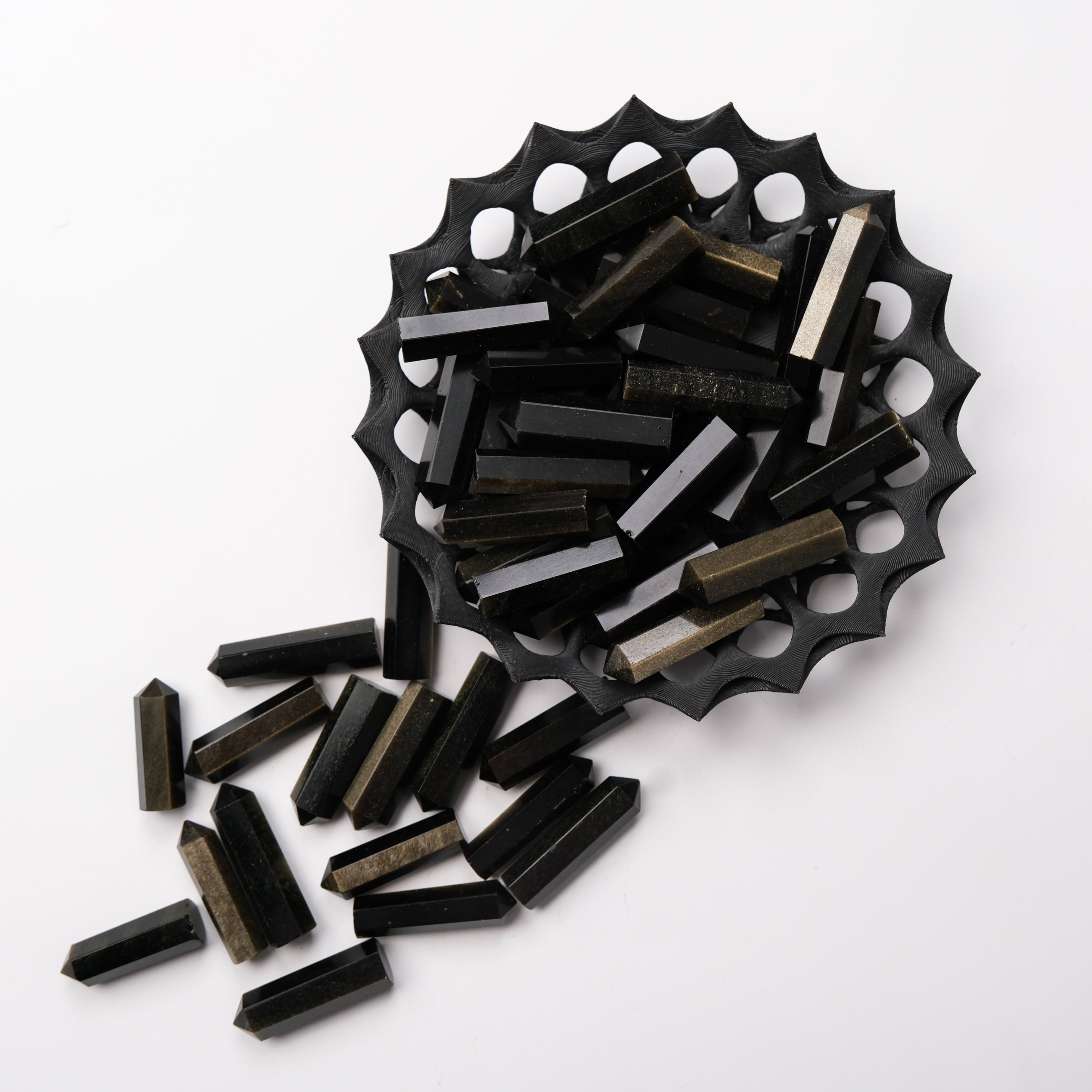 Golden Sheen Obsidian single gridding point from Noctis Studio, featuring a polished, pointed obsidian tool ideal for crystal grid work.
