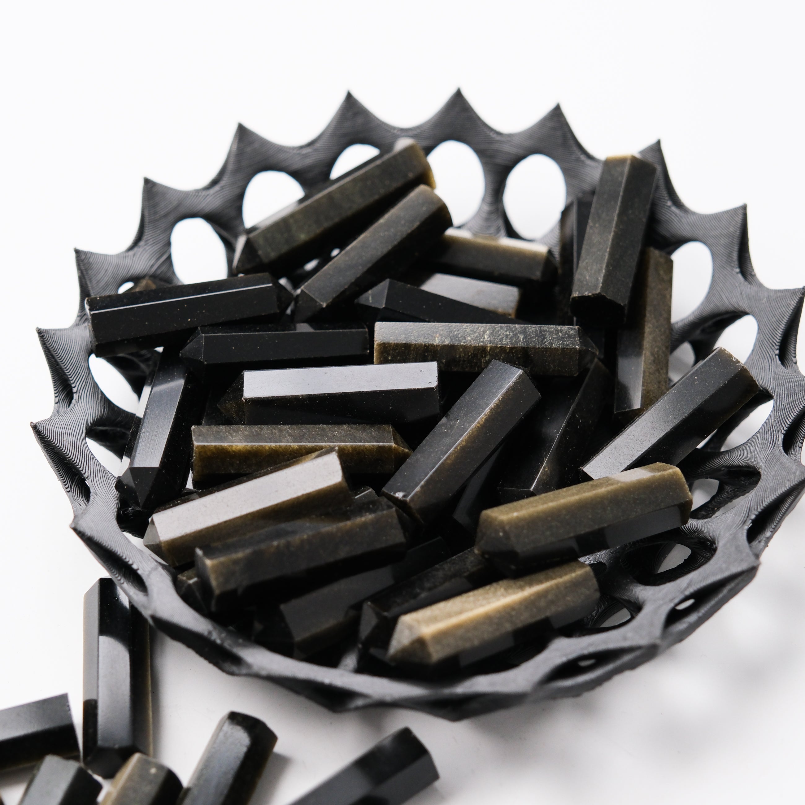 Golden Sheen Obsidian Single Gridding Point from Noctis Studio, showcasing a polished, pointed gemstone tool for crystal healing.