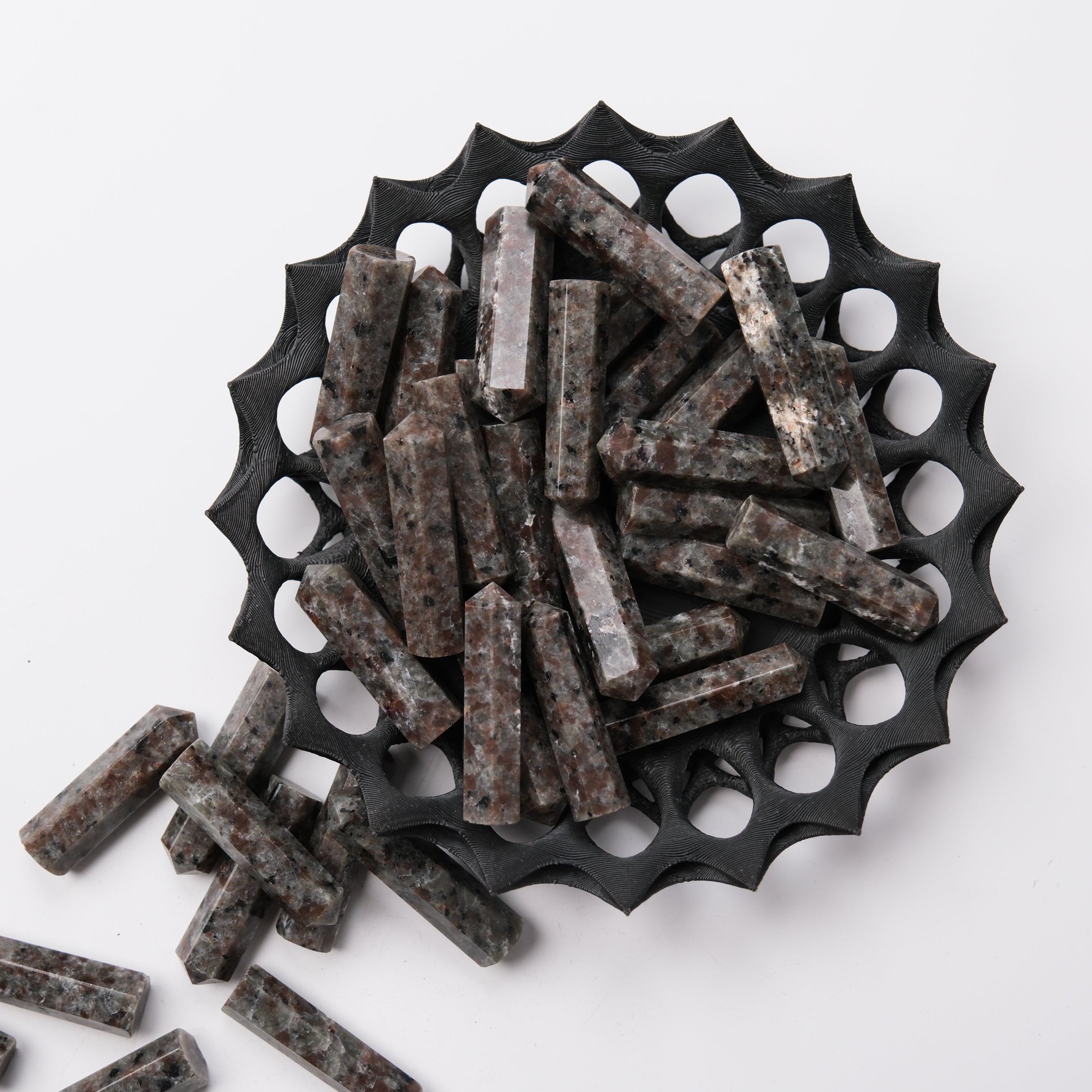 Noctis Studio Yooperlite single gridding point with textured surface, used for jewelry making or mineral collection.