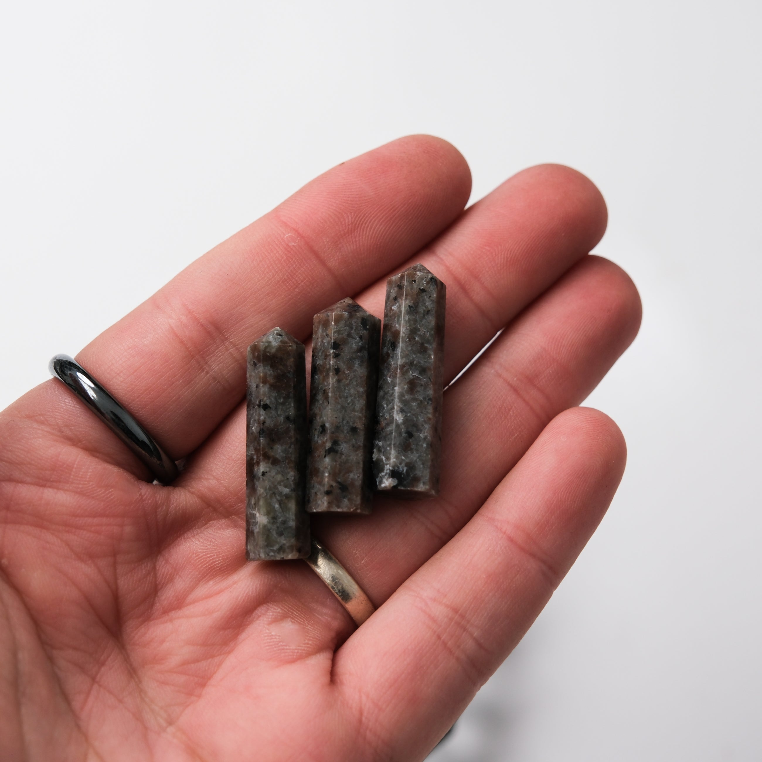 Noctis Studio Yooperlite single gridding point with a glowing mineral surface, designed for gemstone setting and jewelry making.