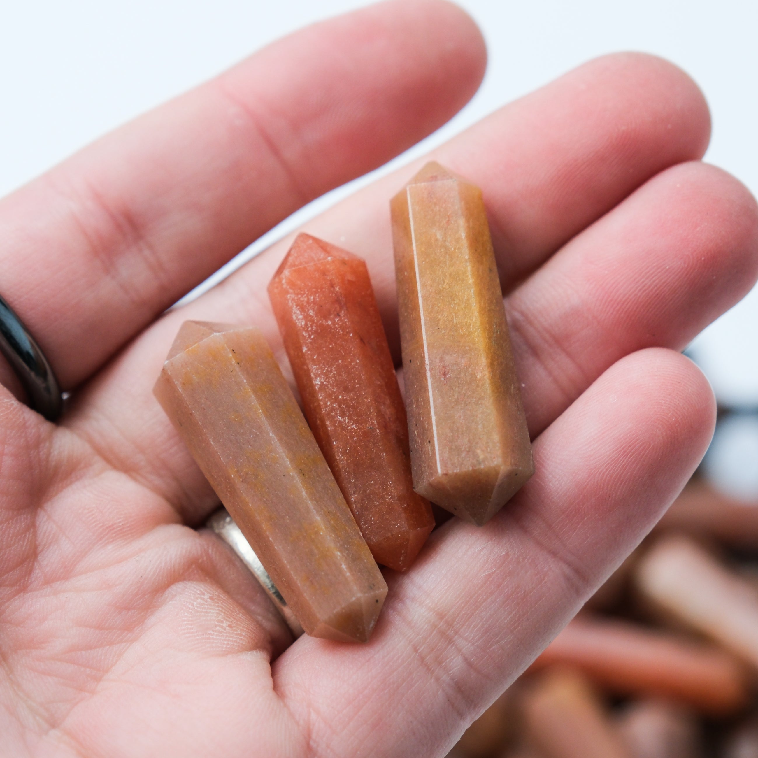 Noctis Studio Peach Aventurine Double Gridding Point with polished, pointed crystal for healing and energy purposes.