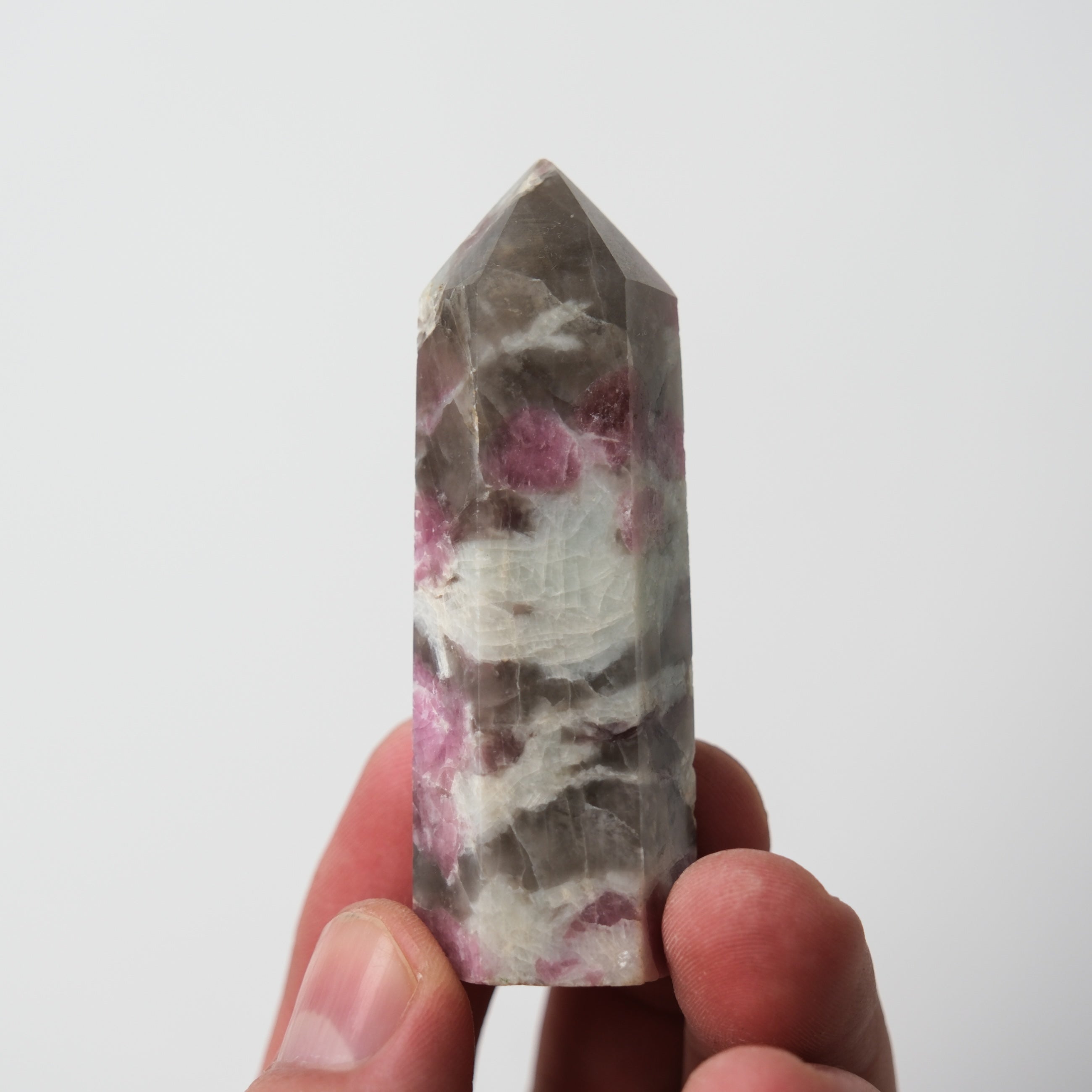 Pink Tourmaline pillar point from Noctis Studio, showcasing a polished pink gemstone with natural crystal formations.