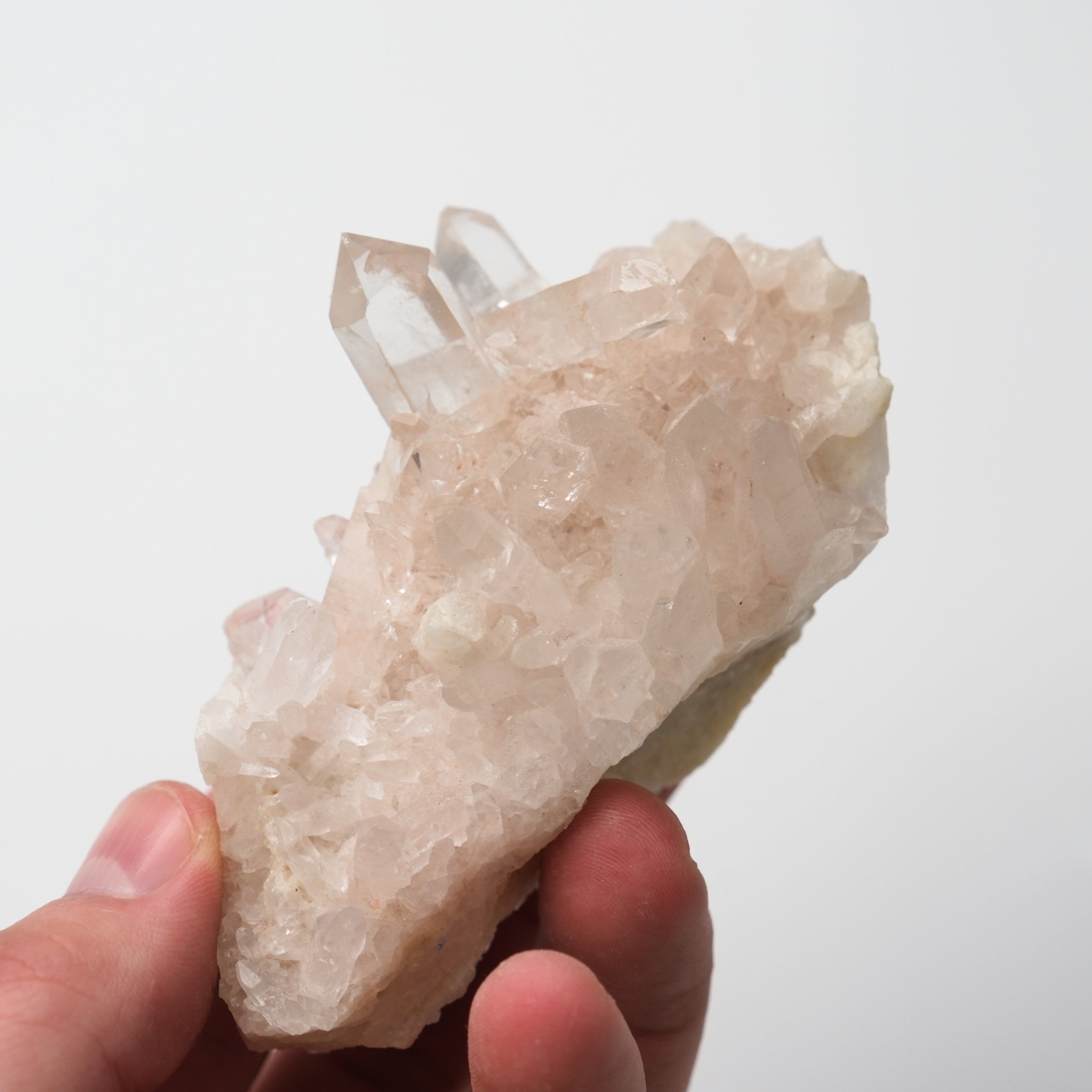 Himalayan Quartz Cluster from Noctis Studio with clear crystal formations and natural mineral textures, displayed on a neutral background.