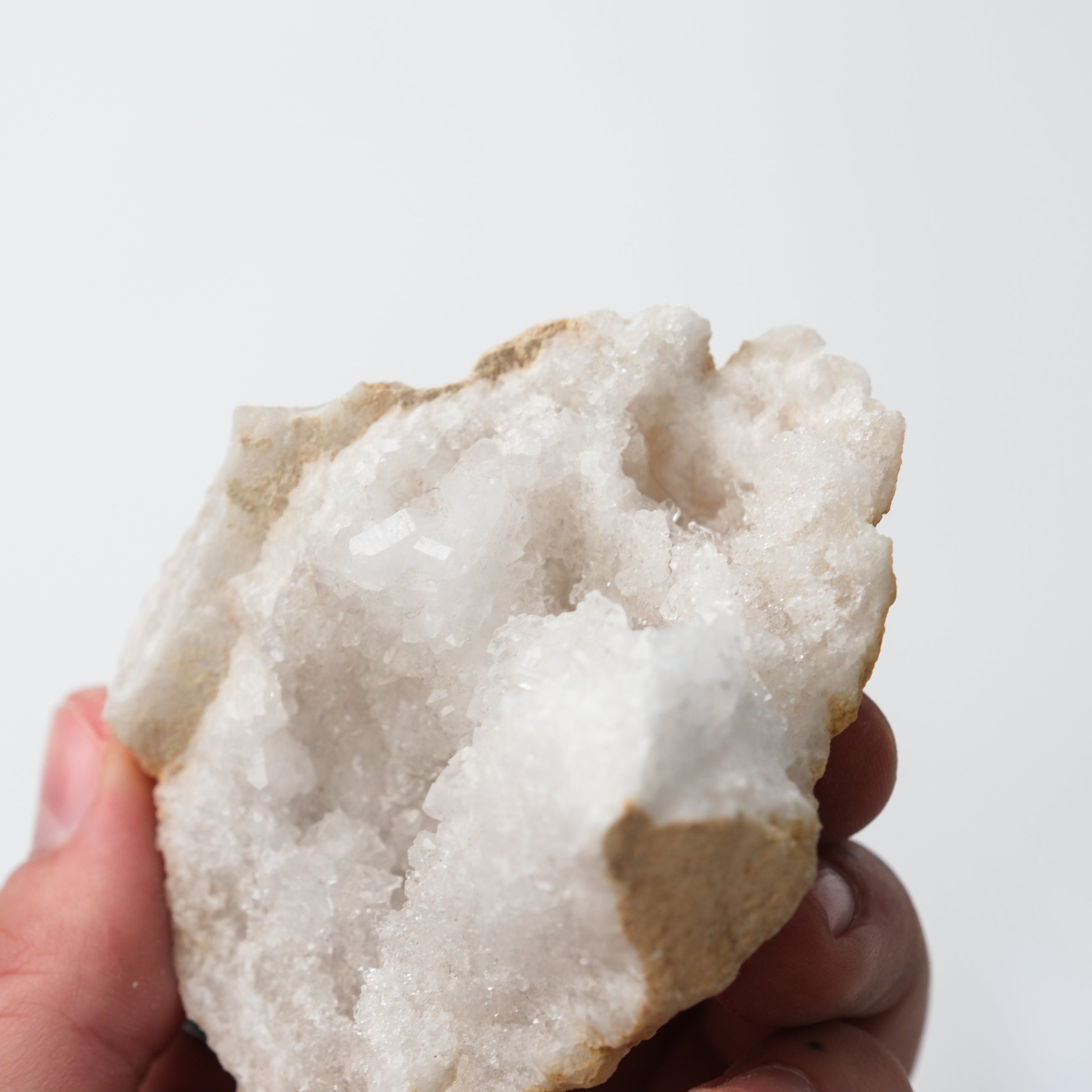 Moroccan Quartz Geode from Noctis Studio showing a natural crystal-filled open geode with sparkling quartz formations inside.