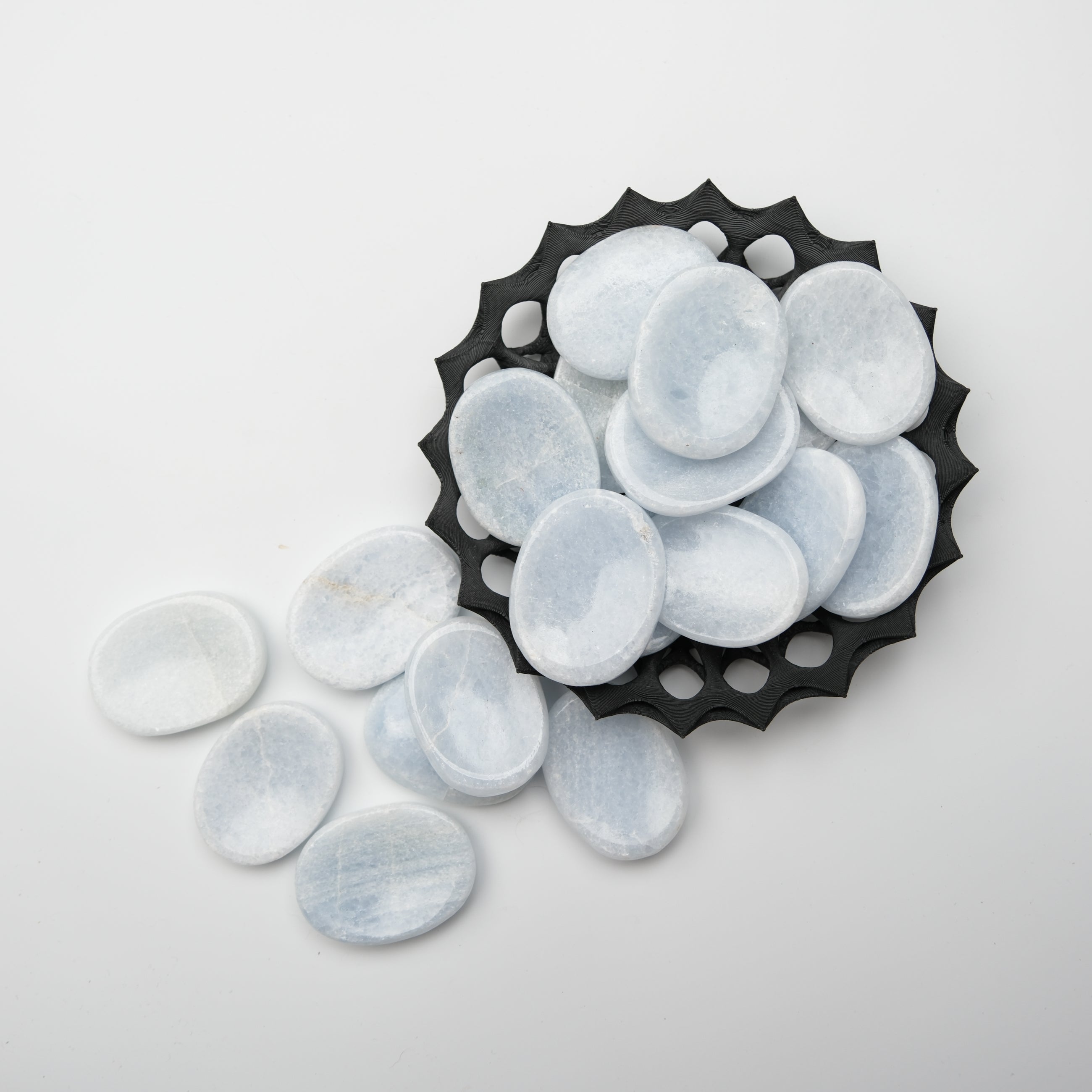 Blue Calcite worry stone from Noctis Studio, smooth polished gemstone with calming blue hues and natural stone texture.