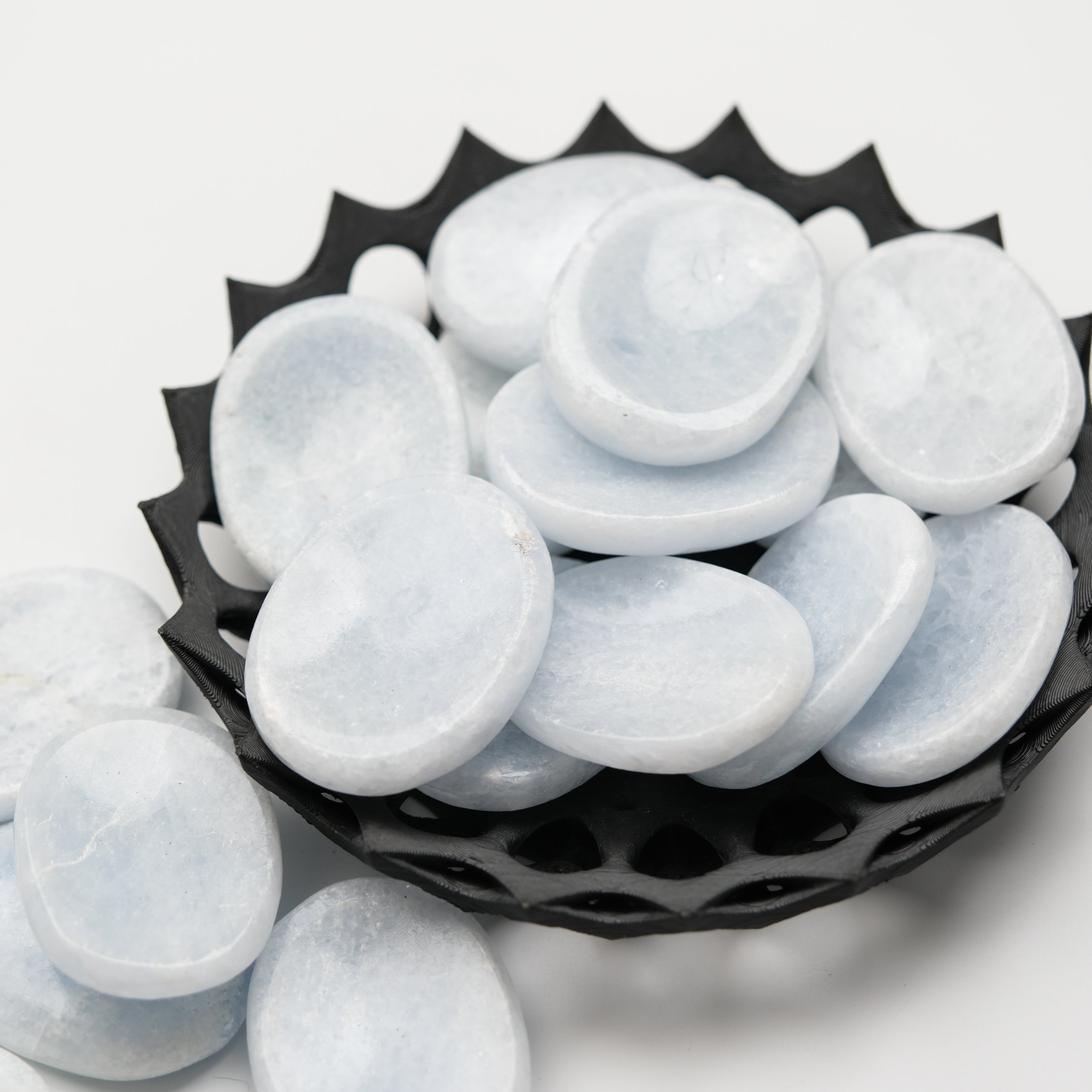 Blue Calcite worry stone from Noctis Studio, smooth polished blue mineral with calming, rounded shape for stress relief.
