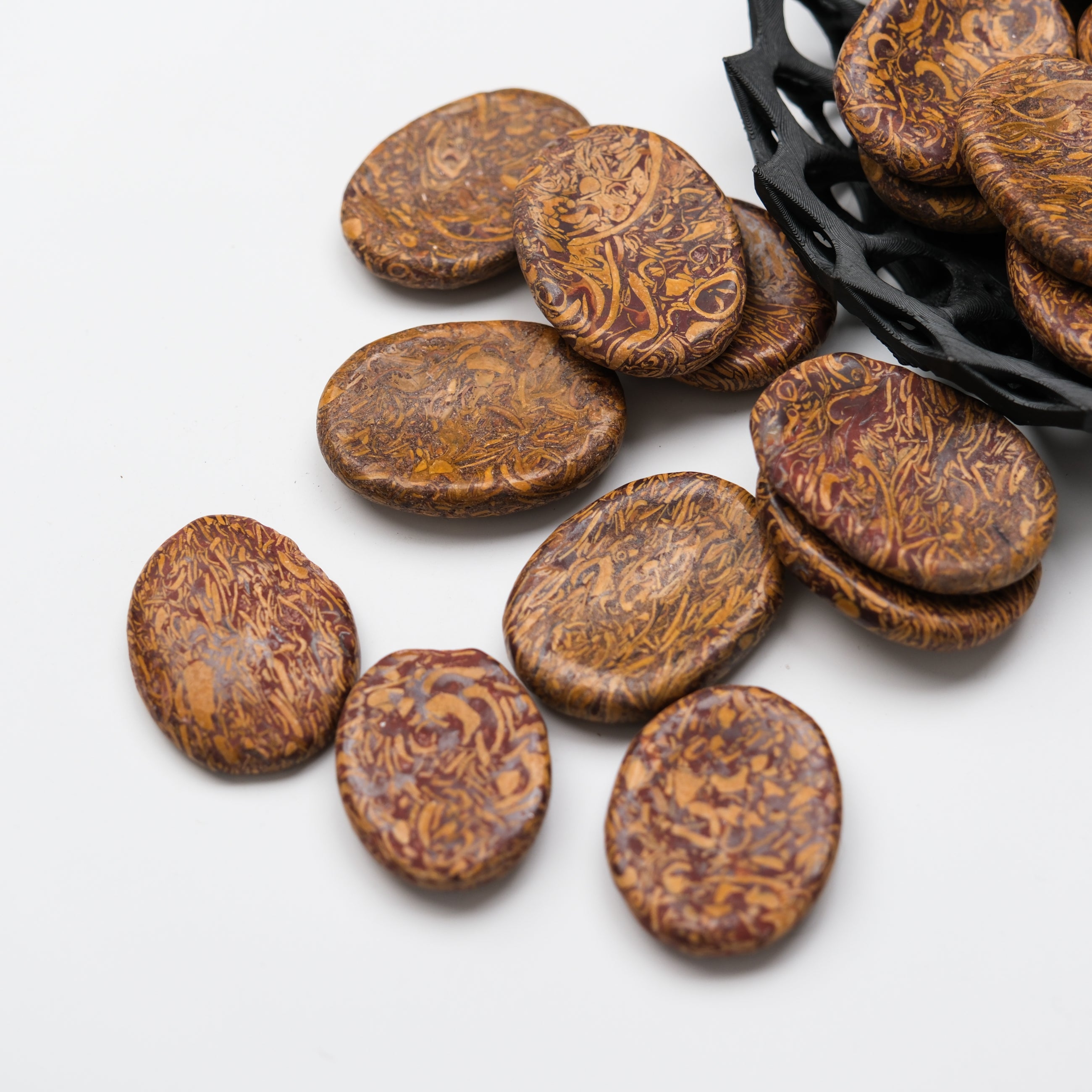 Smooth Snake Jasper worry stone from Noctis Studio, featuring a polished, oval-shaped gemstone with natural earthy patterns.