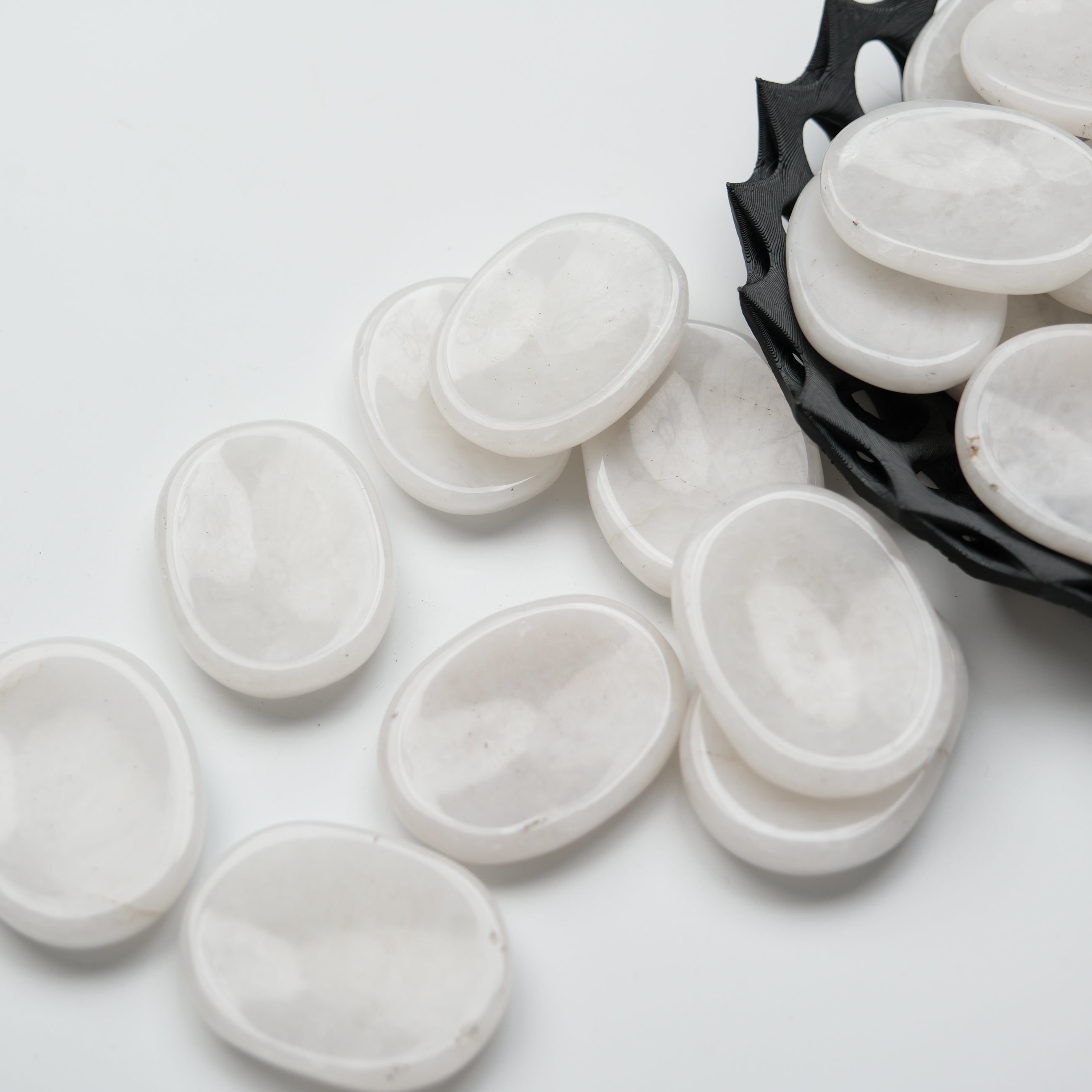 Snow Quartz worry stone by Noctis Studio, smooth polished worry stone with white and translucent quartz appearance.