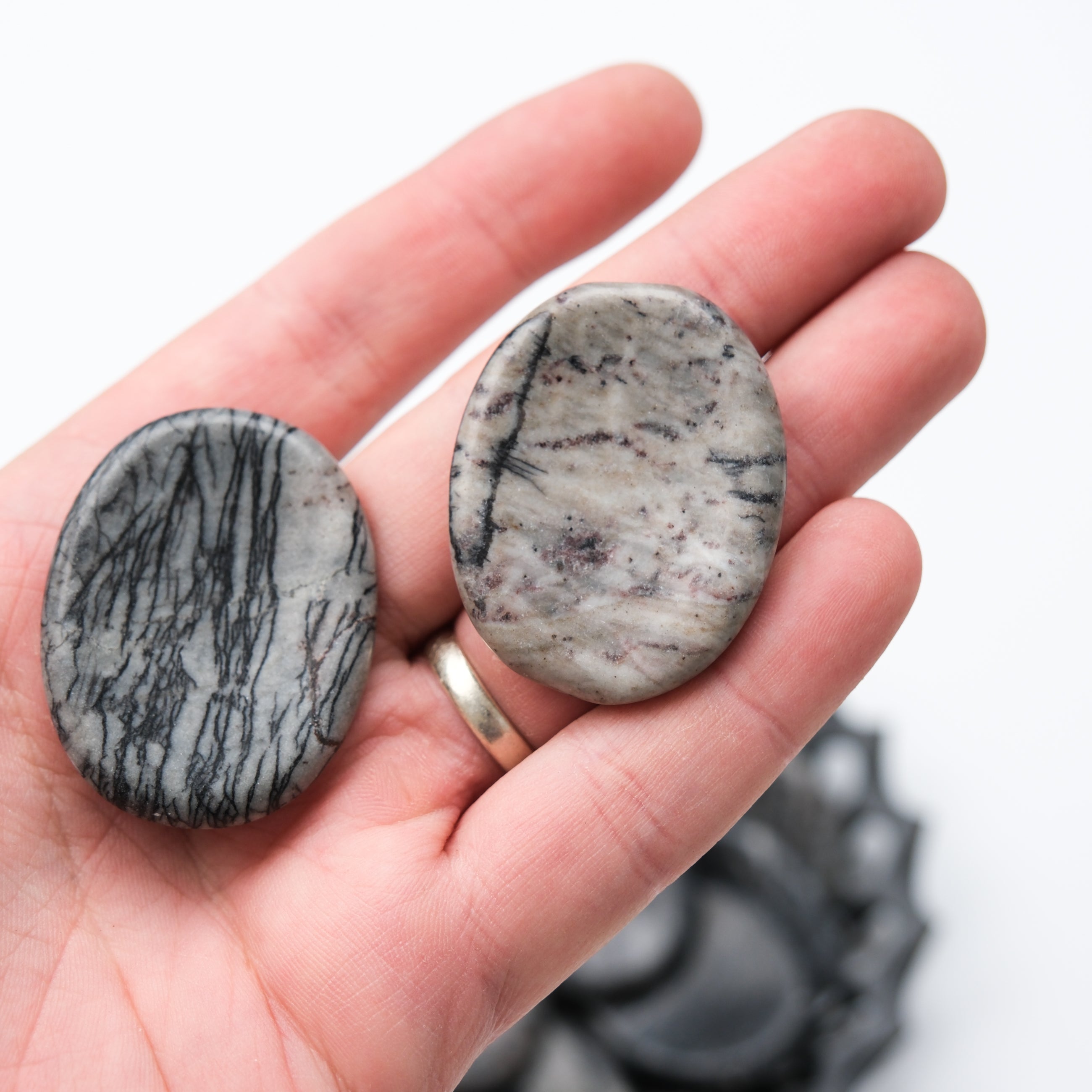 Smooth Picasso Jasper worry stone from Noctis Studio, showcasing polished, artistic gemstone with natural patterns and calming appearance.