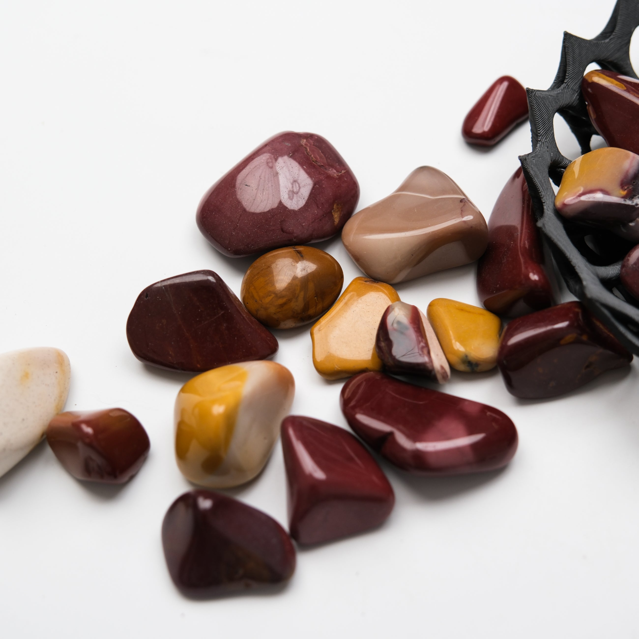 Mookaite Tumble Stone from Noctis Studio showing polished, multicolored jasper with smooth rounded surface.