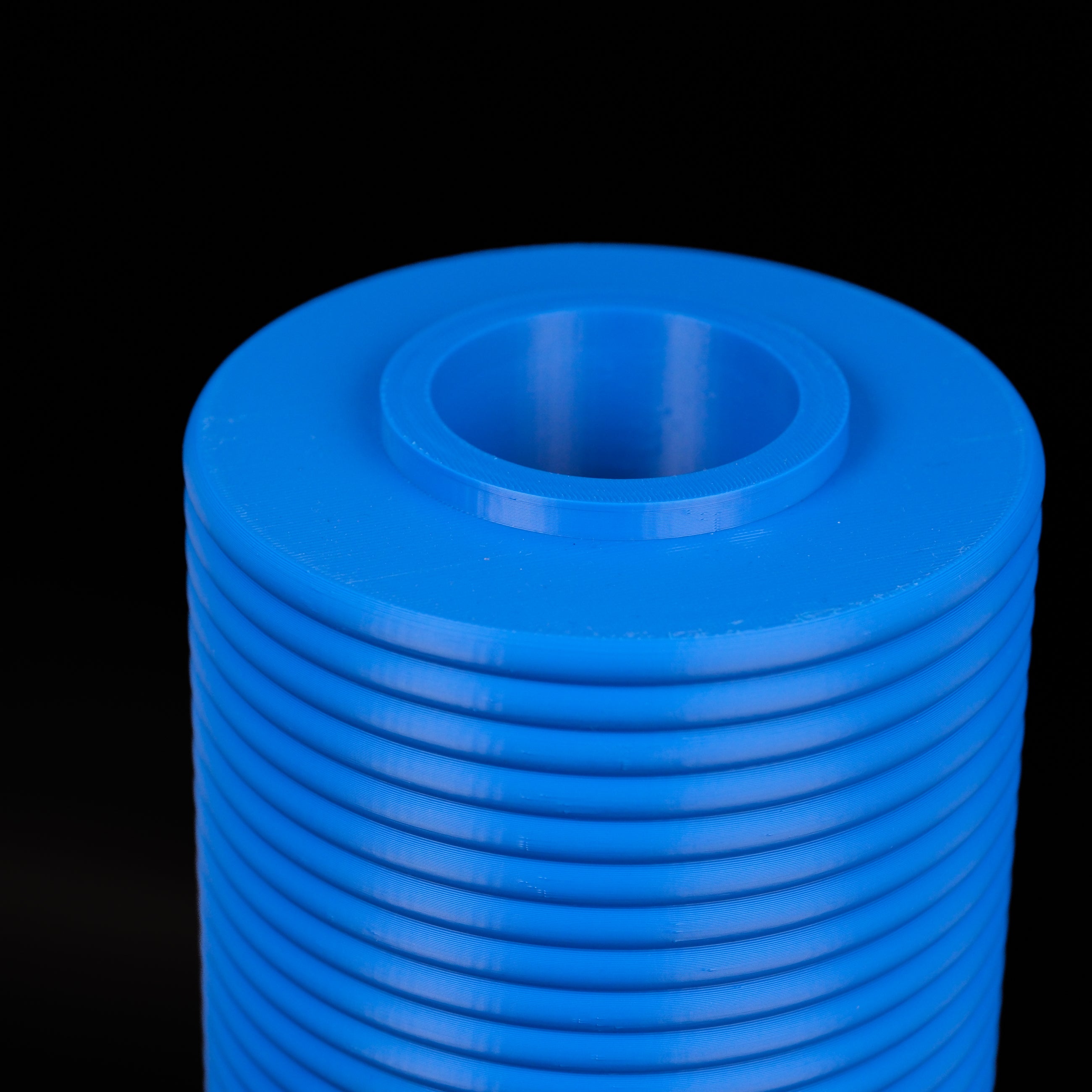 Modern Machine column vase with a sleek, tall design, featuring a smooth ceramic finish and minimalist style.