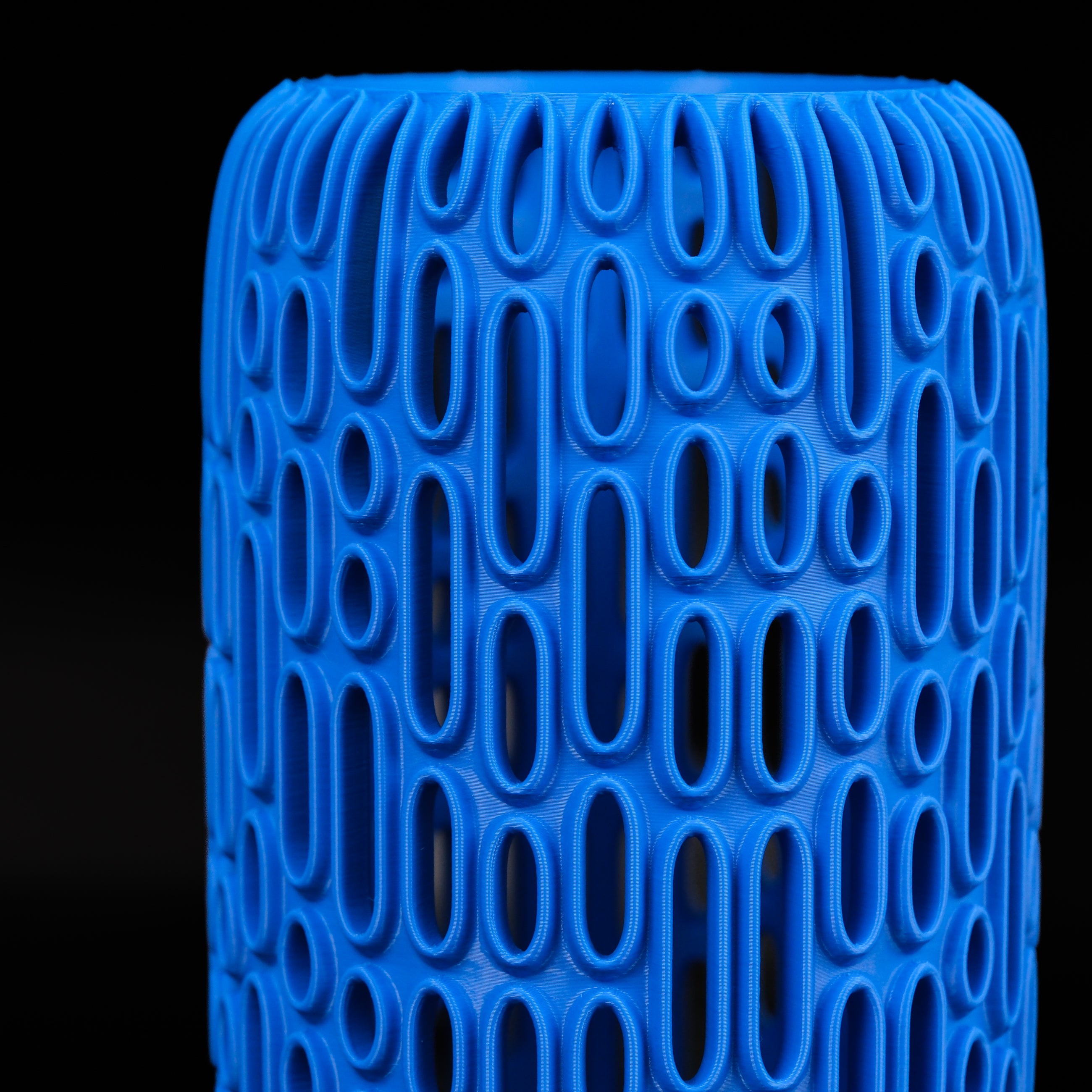 Modern Machine Orbit Vase, sleek ceramic vase with a smooth, rounded design suitable for modern home decor.