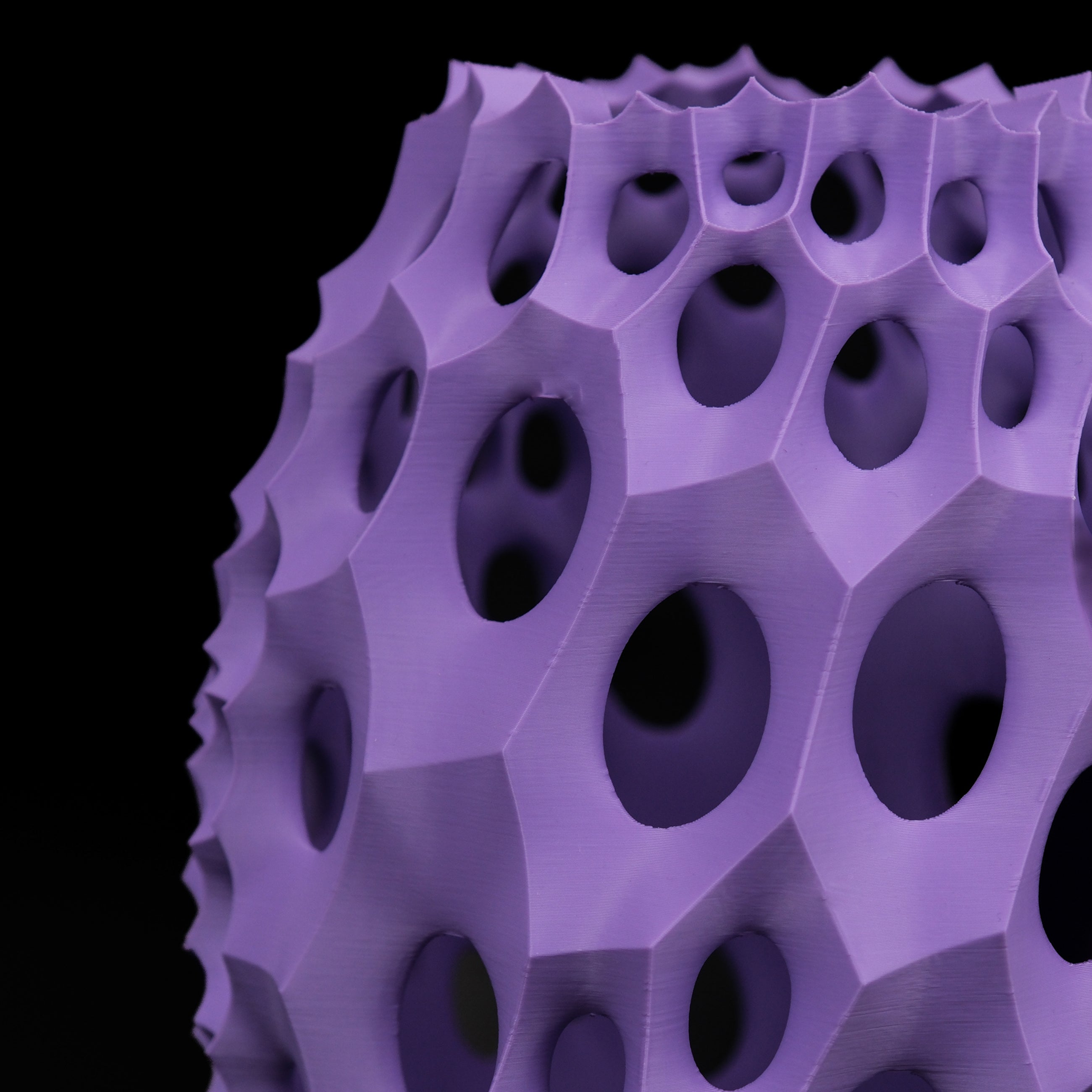 Modern Machine lattice vase with intricate geometric pattern, ceramic material, and a sleek, modern design for decorative use.
