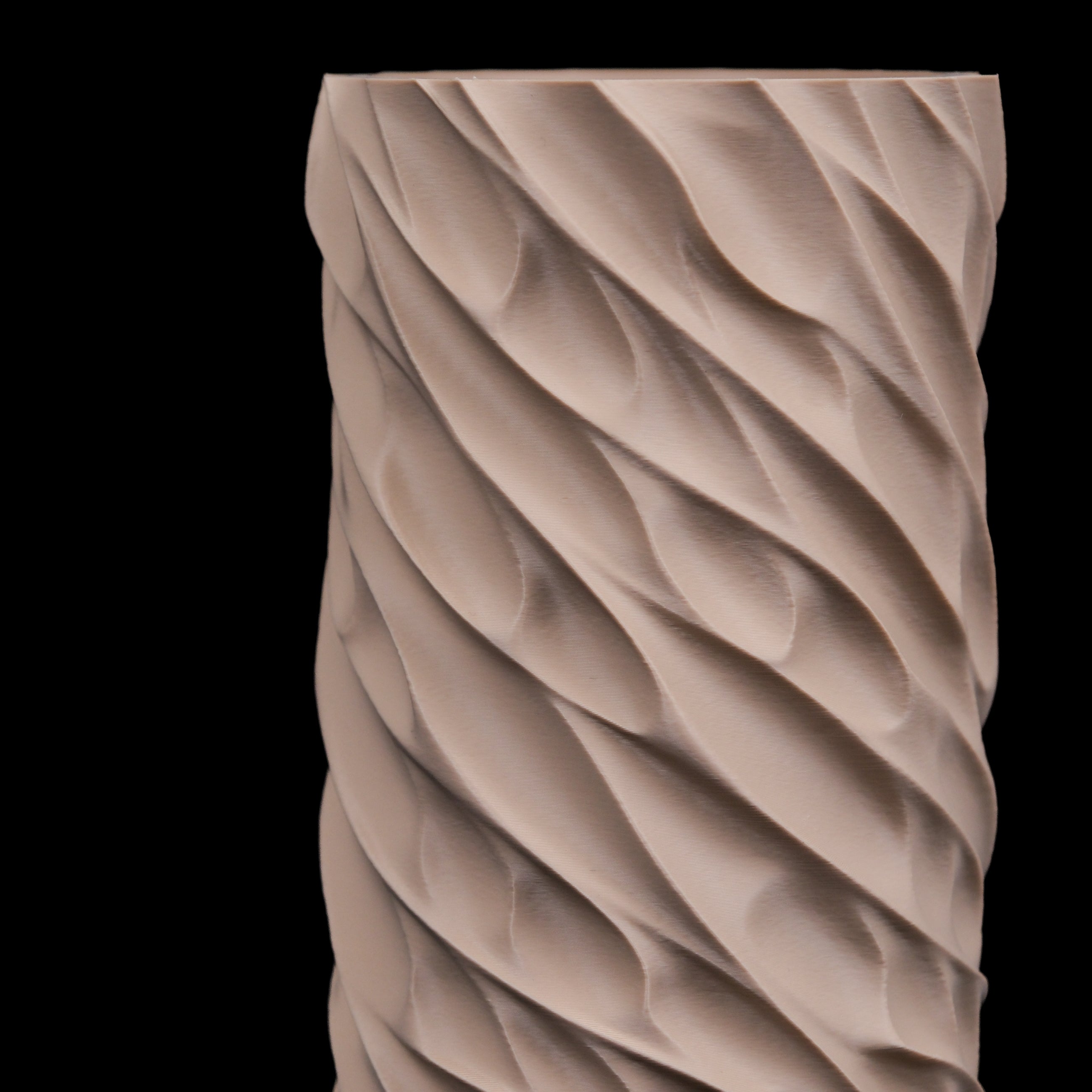 Modern Machine torsion column vase with sleek, sculptural design, showcasing its artistic ceramic finish and contemporary style.