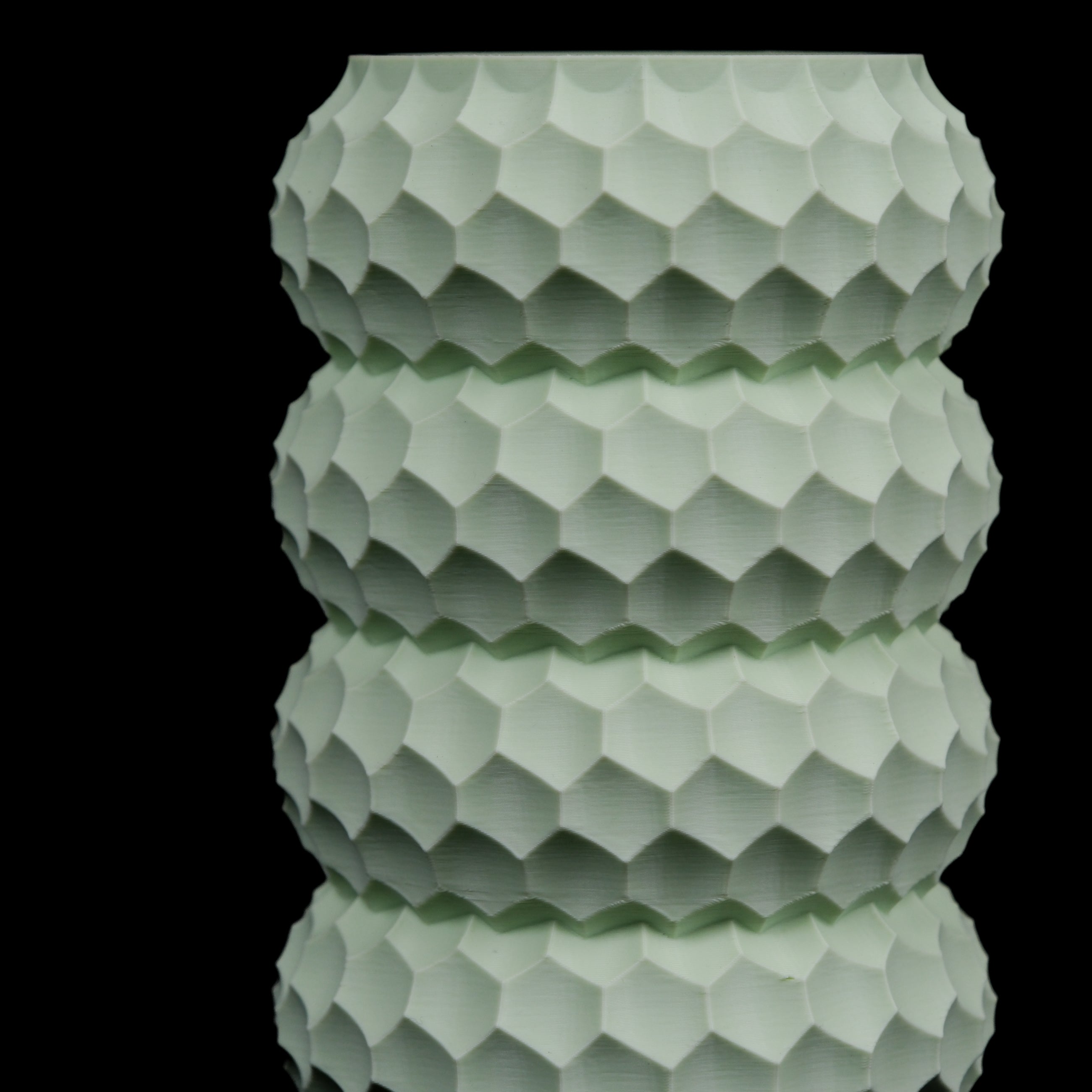 Modern Machine Splice Vase featuring a unique, colorful ceramic design with a smooth, rounded shape and artistic pattern.