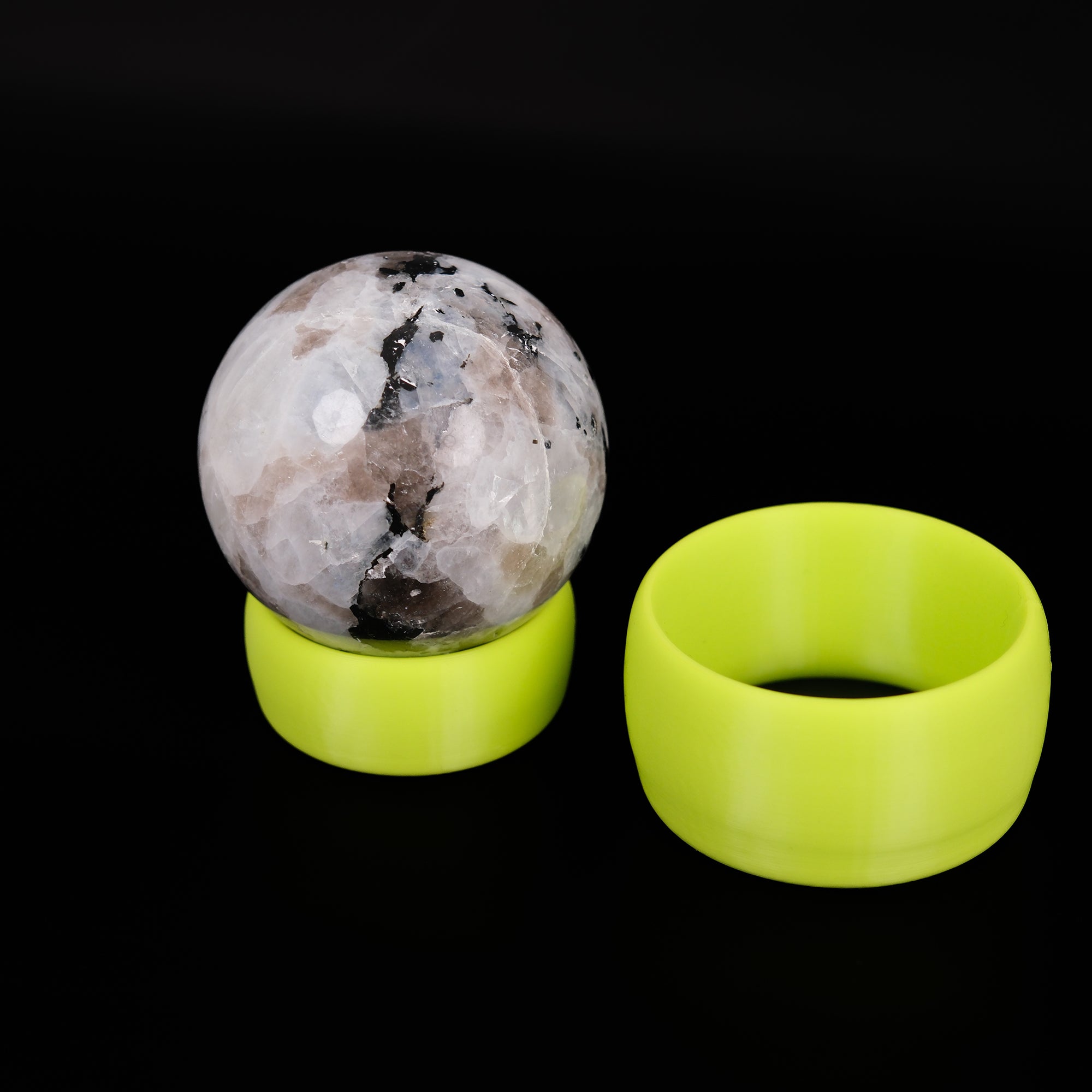 Noctis Studio Sphere Stand display stand with a sleek, round design, ideal for showcasing small objects or collectibles.