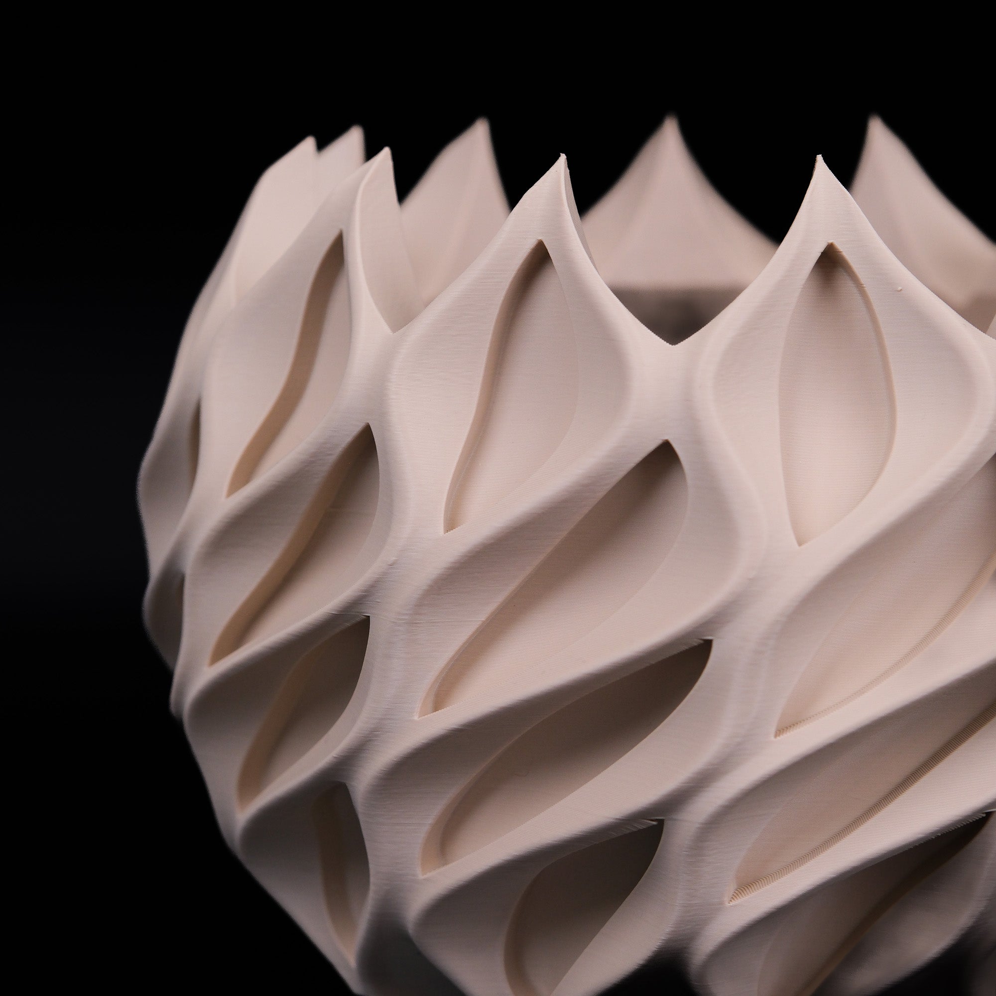 Modern Machine Helix Planter with a sleek, spiral design perfect for indoor or outdoor gardening displays.