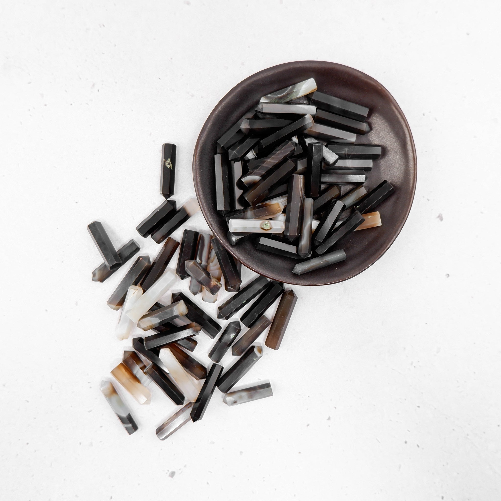 Black Sulemani Agate single gridding point by Noctis Studio, featuring a polished black agate stone with a pointed tip for precise use.