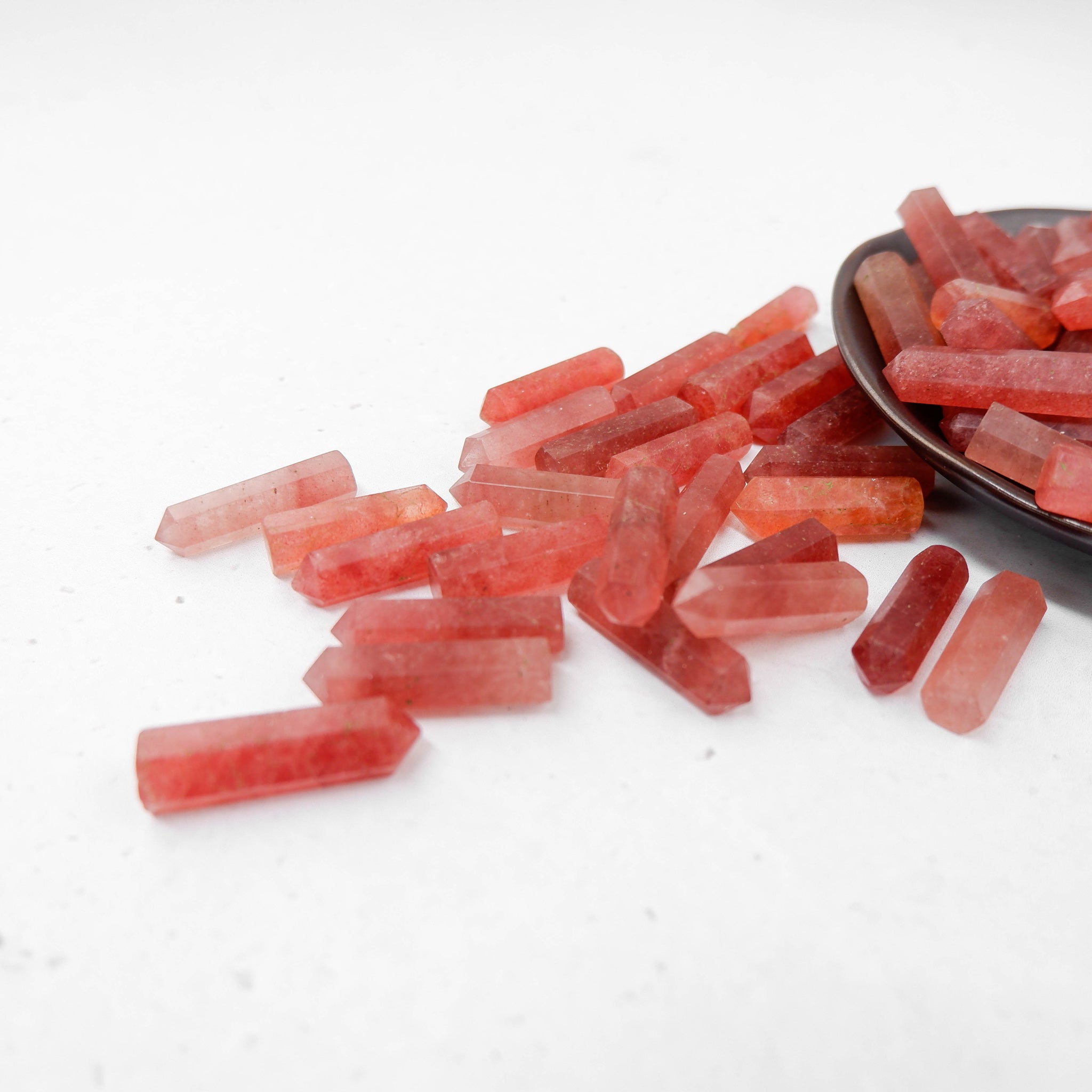 Strawberry Quartz single gridding point by Noctis Studio, showcasing a polished quartz crystal with a pointed tip for energy work.