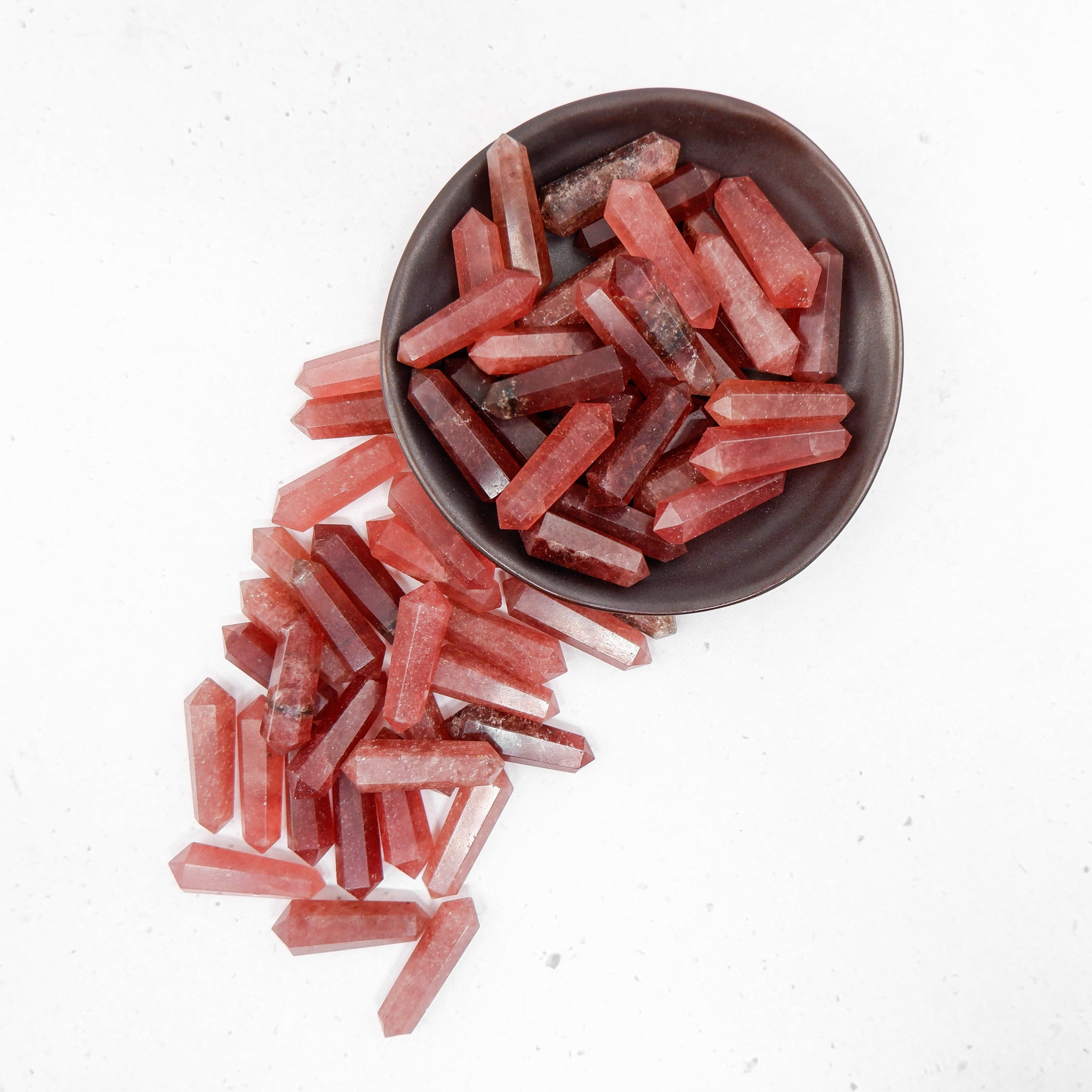 Strawberry Quartz Double Gridding Point from Noctis Studio, a polished gemstone tool for healing and energy work.